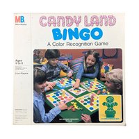 A vintage 1970s board game box for "Candy Land Bingo." The cover art features the iconic King Kandy and the colorful, sugary landscape of Candy Land in a bright 1970s primary color palette. The box shows visible shelf wear and age-appropriate softening of the corners, reflecting its history as a well-loved family game.