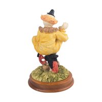 Vintage Waving Clown Figurine: Bicycle Rider