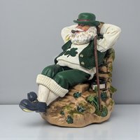 Vintage 2000 Clothique Possible Dreams Irish Storyteller: Musical Santa Figure