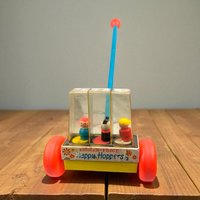 1969 Fisher-Price Happy Hoppers Push Toy