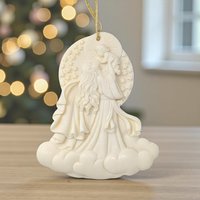 Cream-colored resin ornament featuring a relief carving of Mary holding the infant Jesus.