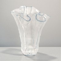 A clear glass vase with a thick, stable base that transitions into a dramatic, fluid ruffled rim. The glass is crystal clear with a high-shine finish, capturing light through its organic, wavy silhouette.