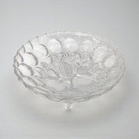 A clear pressed glass bowl with a subtle pedestal base. The interior features an intaglio fruit motif, while the rim is finished with a classic ruffled or "sawtooth" edge.