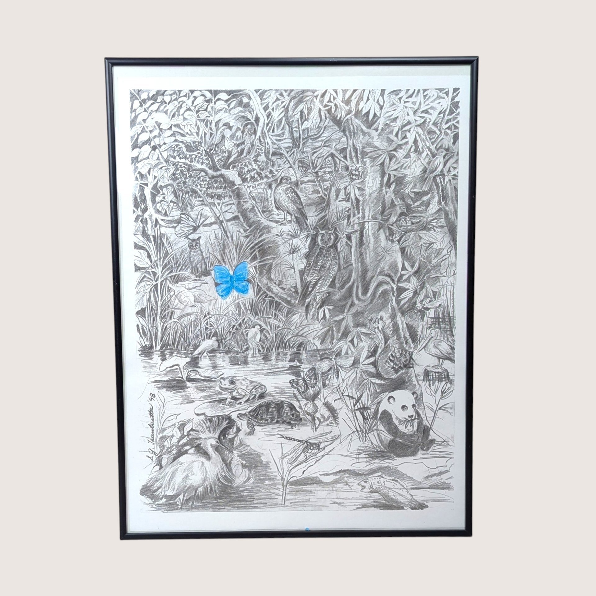A framed pencil drawing of a dense forest filled with animals, featuring a single bright blue butterfly.