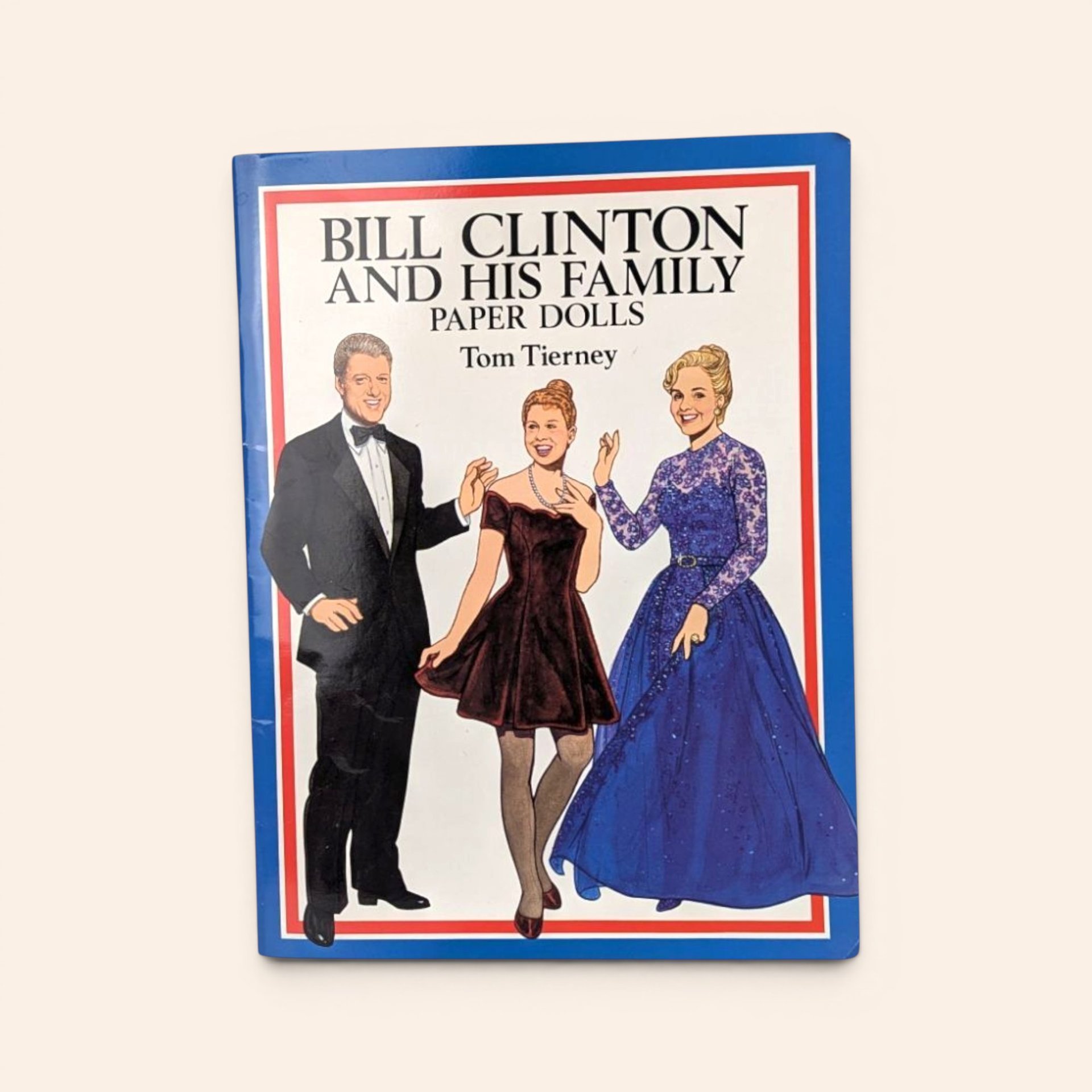 Front cover of an unused 1994 Bill Clinton and His Family paper doll book illustrated by Tom Tierney.