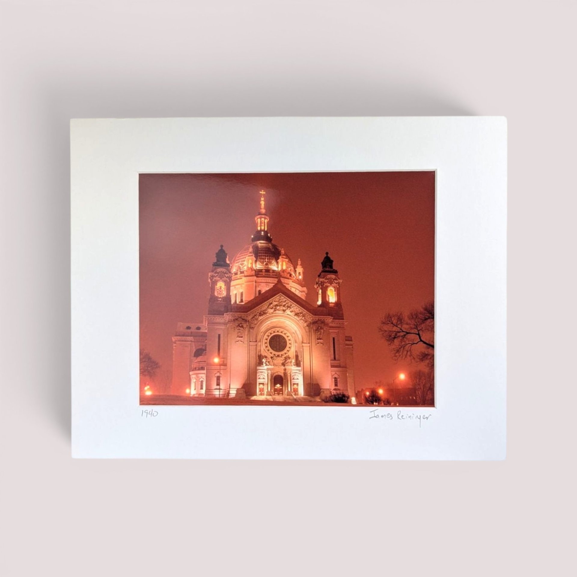 Signed vintage nighttime photography print of the Saint Paul Cathedral in Minnesota matted on a white background.