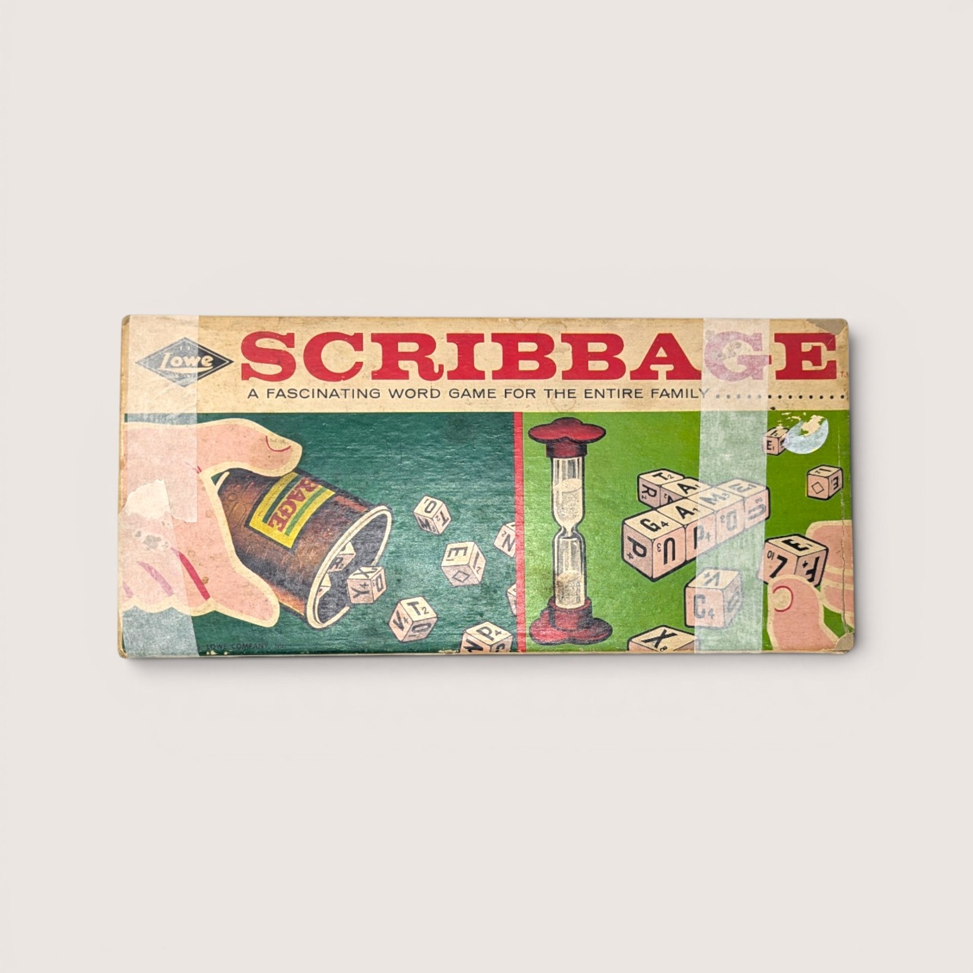 Vintage 1963 Scribbage word game box by E.S. Lowe featuring retro illustrations of letter dice an hourglass and hands.