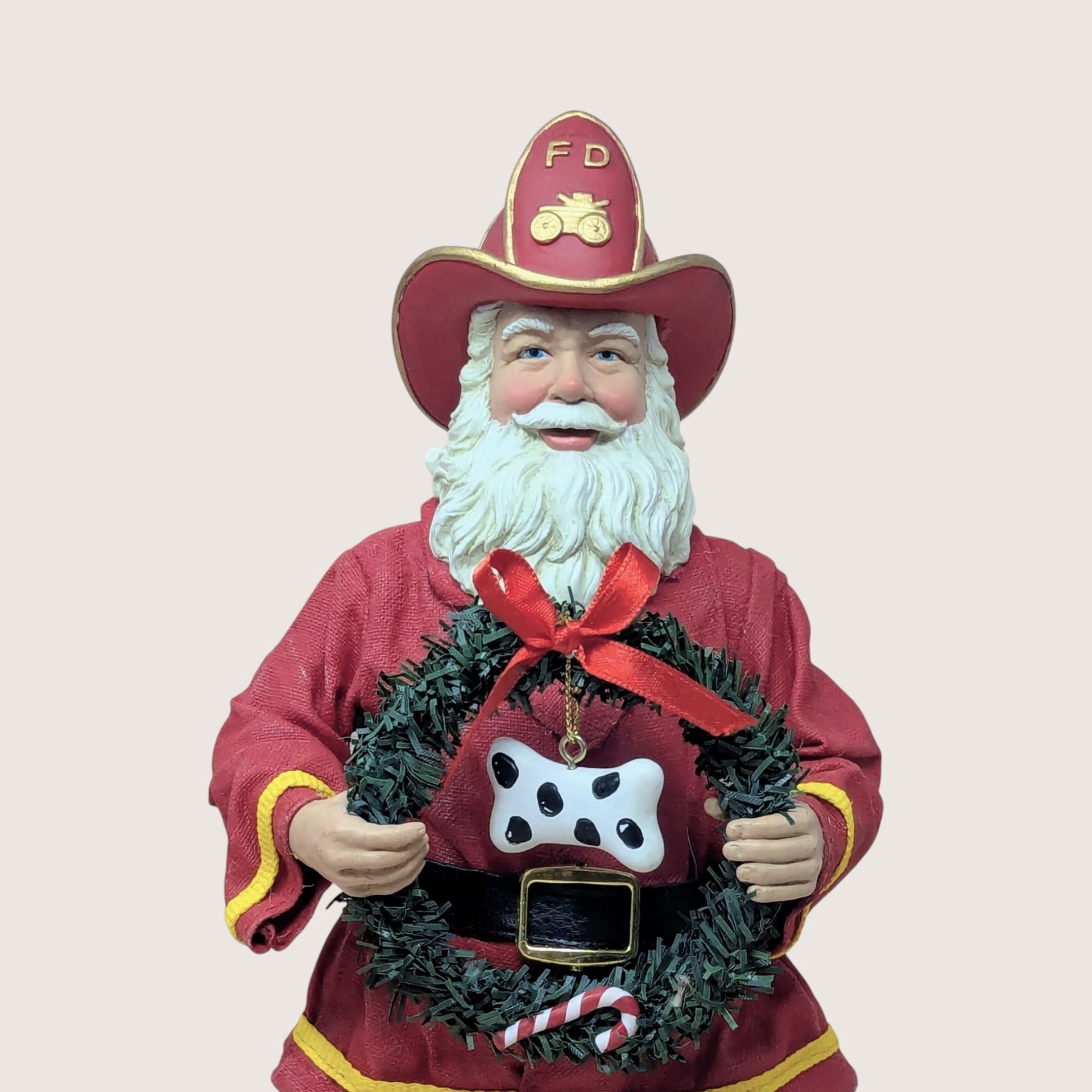 1990s Fabriche Fireman Santa Holding Wreath Figurine