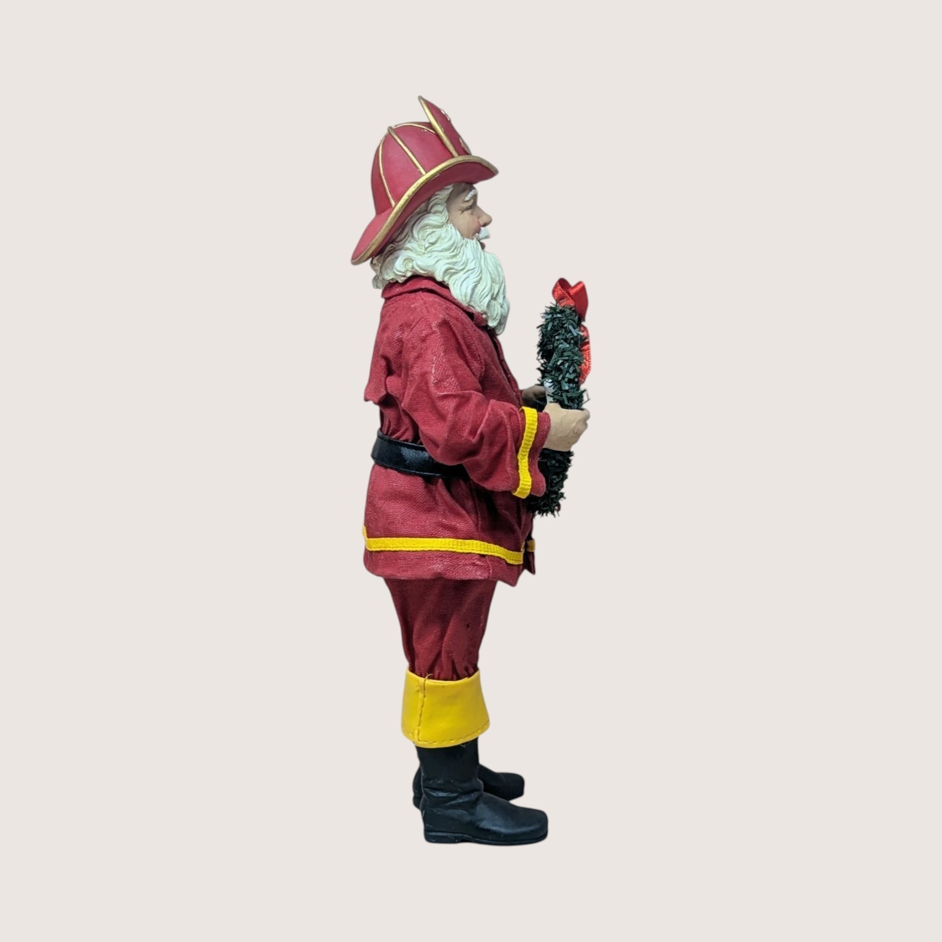 1990s Fabriche Fireman Santa Holding Wreath Figurine