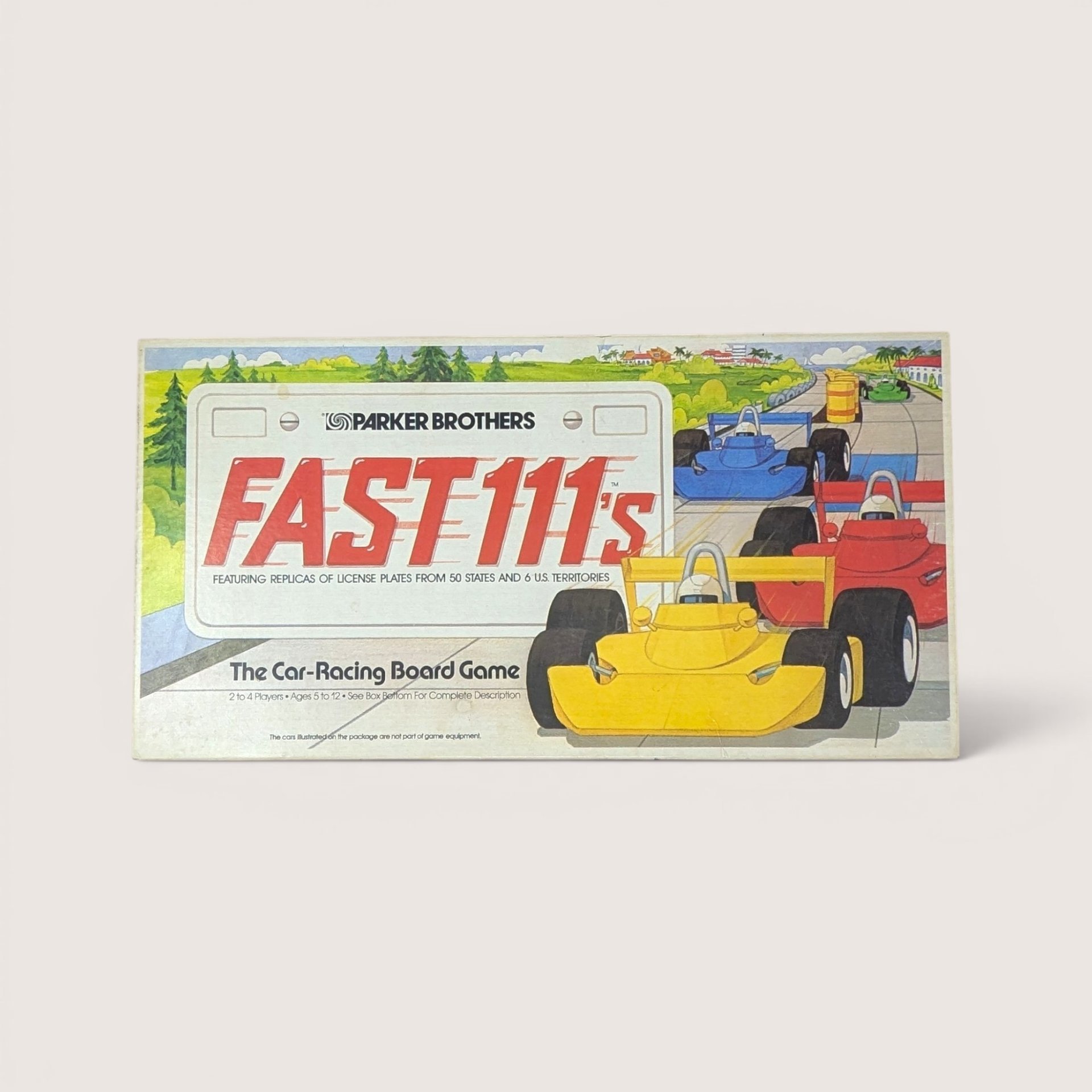 Vintage 1981 Parker Brothers Fast 111s car racing board game in its original illustrated box.