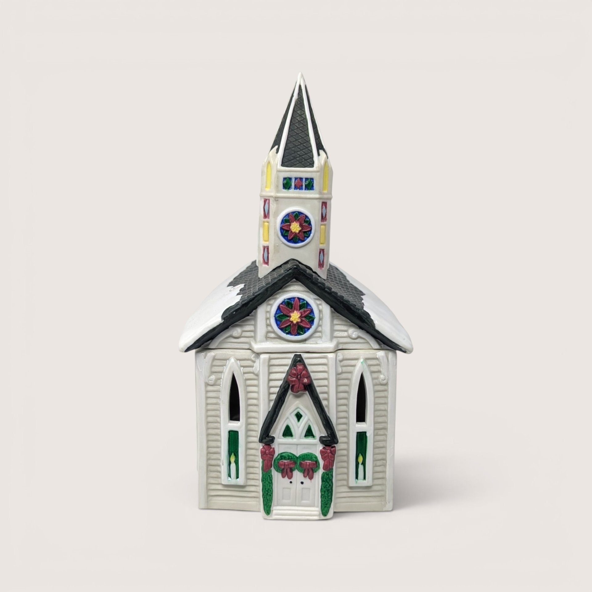 Vintage 1995 Claire Burke Christmas Memories handpainted ceramic church tealight candle holder luminary with a black steeple.