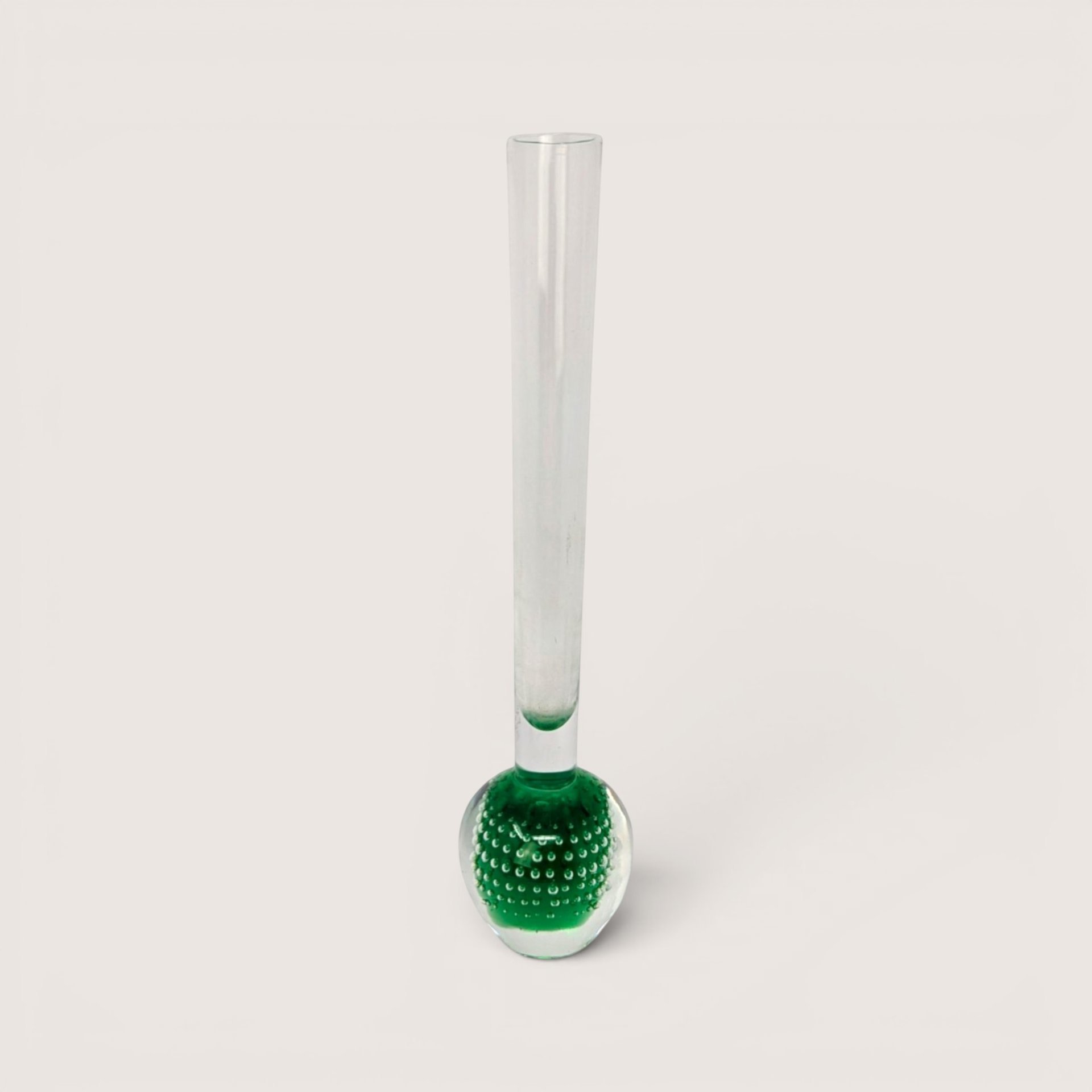 Vintage Holmegaard Orchid art glass vase featuring a clear stem on a weighted green controlled bubble base.