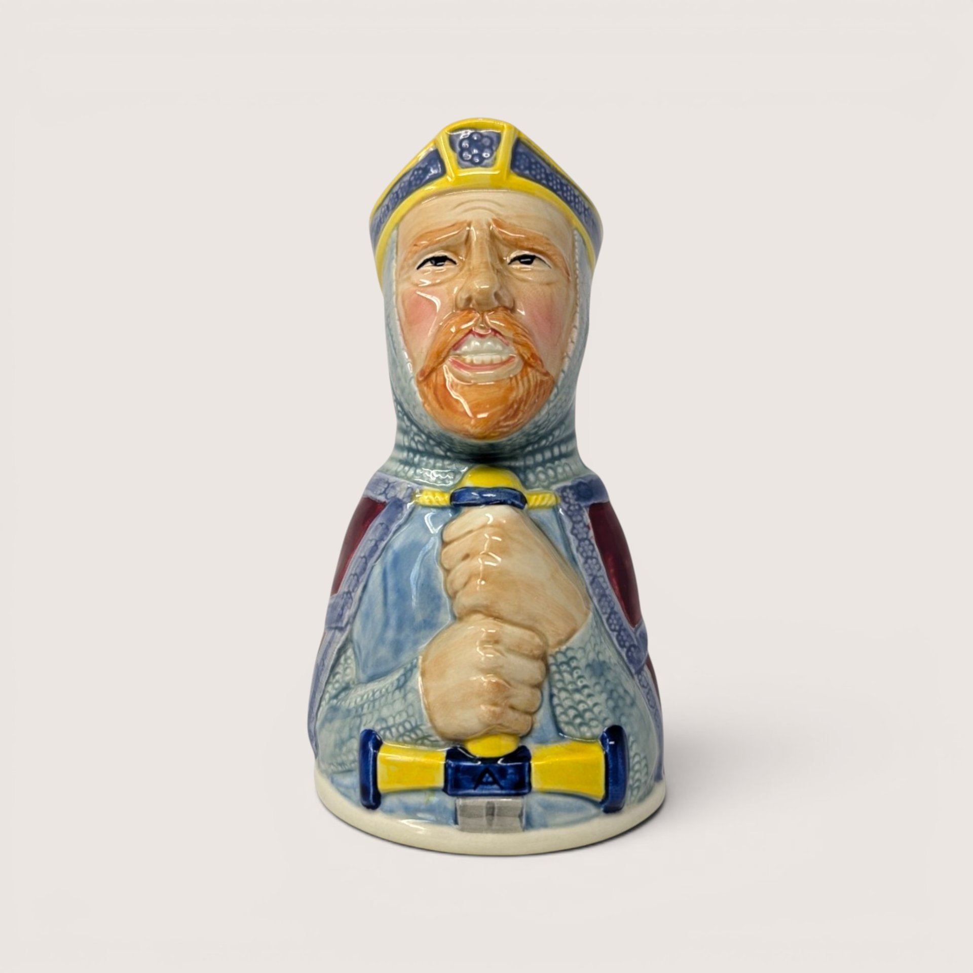 Vintage 1983 Royal Cornwall ceramic King Arthur Toby bell featuring the king holding a sword.