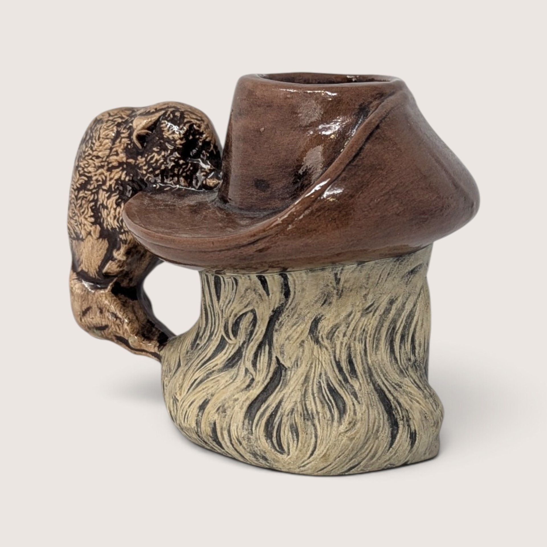 Vintage hand-painted ceramic character mug depicting Buffalo Bill Cody with a sculpted bison handle and "DAD" inscribed on the base.
