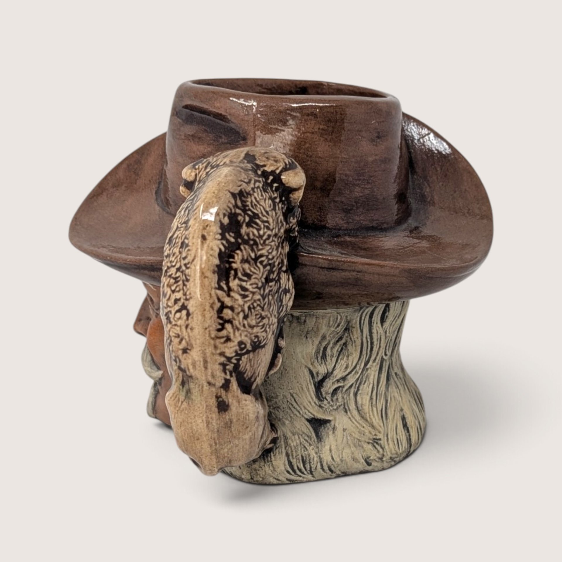 Vintage hand-painted ceramic character mug depicting Buffalo Bill Cody with a sculpted bison handle and "DAD" inscribed on the base.