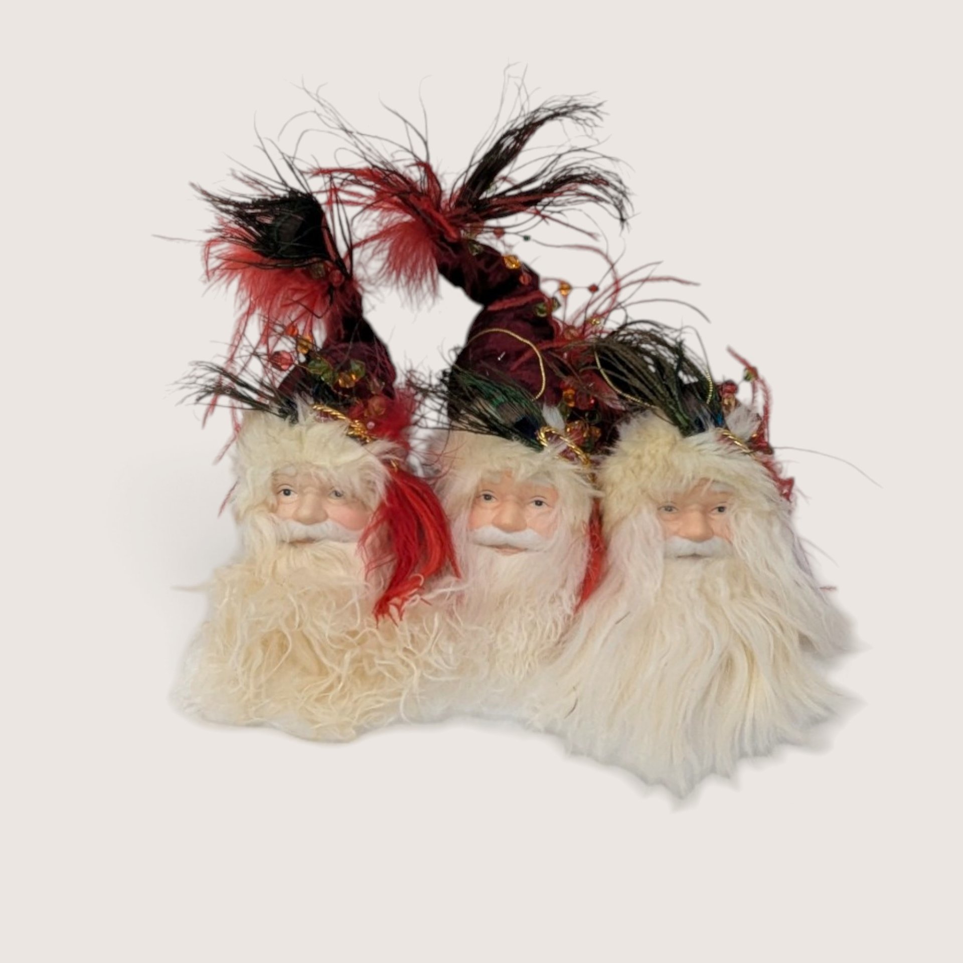 Set of 3 vintage Santa head ornaments and shelf sitters featuring long feathery burgundy hats.