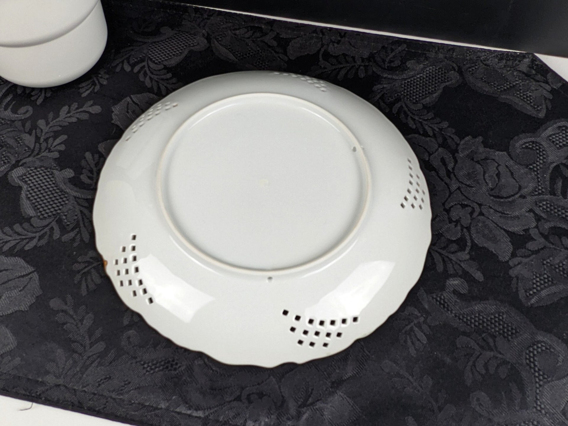 Reticulated Plate with Pink Roses on a Green Background