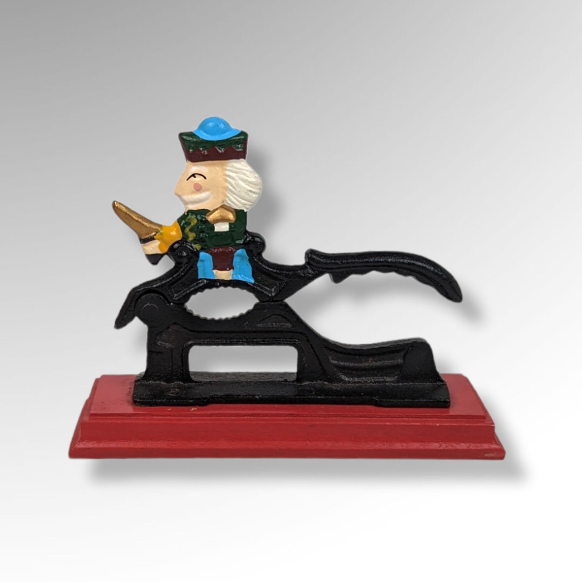 Vintage Cast Iron Nutcracker on a Wood Base