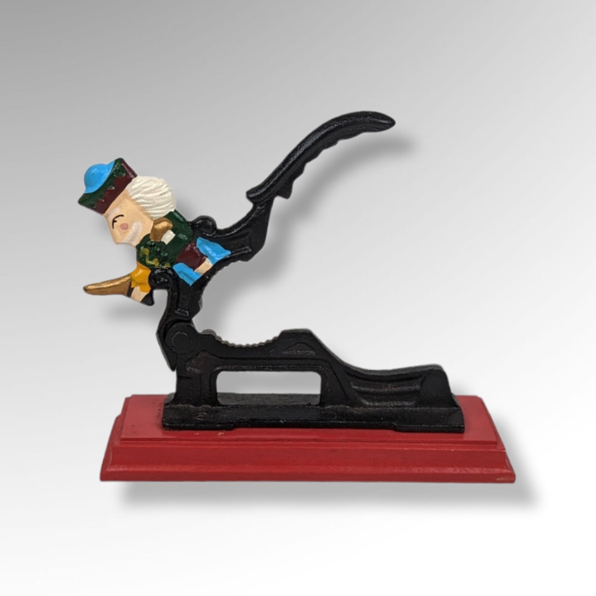 Vintage Cast Iron Nutcracker on a Wood Base