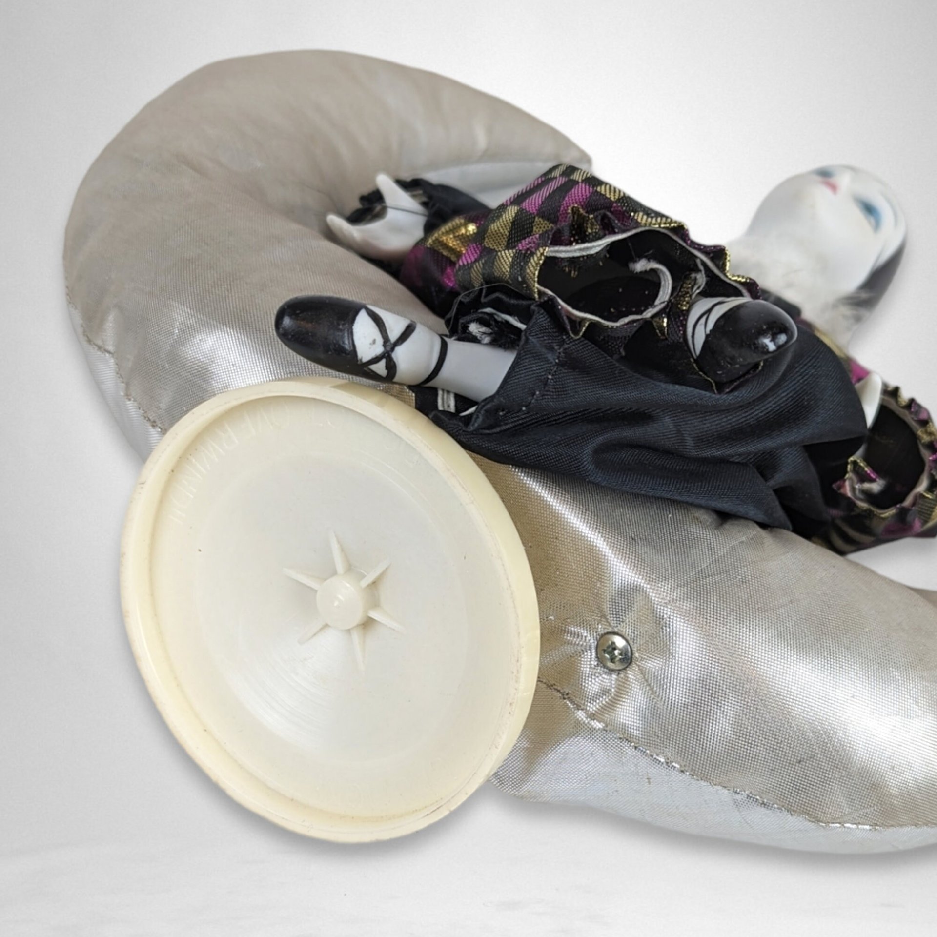 Harlequin Musical Doll on Moon