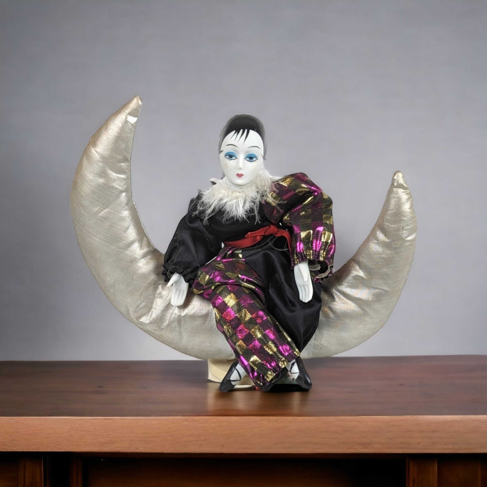 Harlequin Musical Doll on Moon