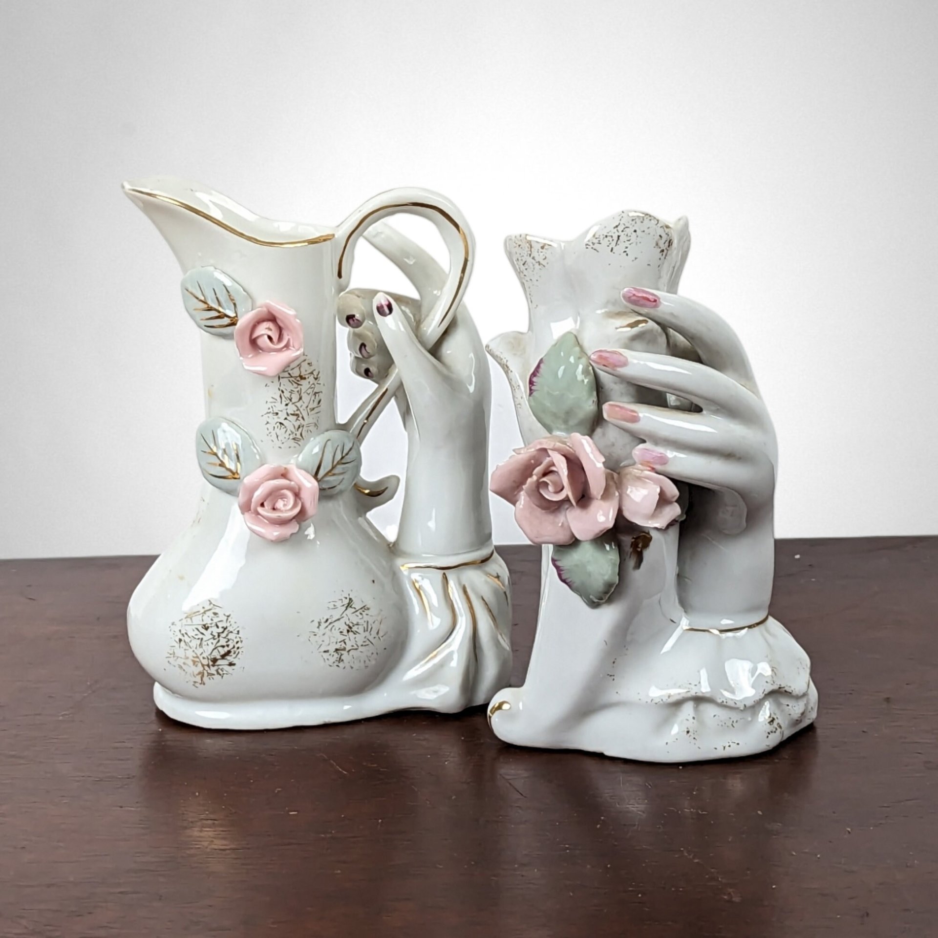 Timeless Elegance: Vintage Ceramic Hand Vases - A Pair of Artistic Grace