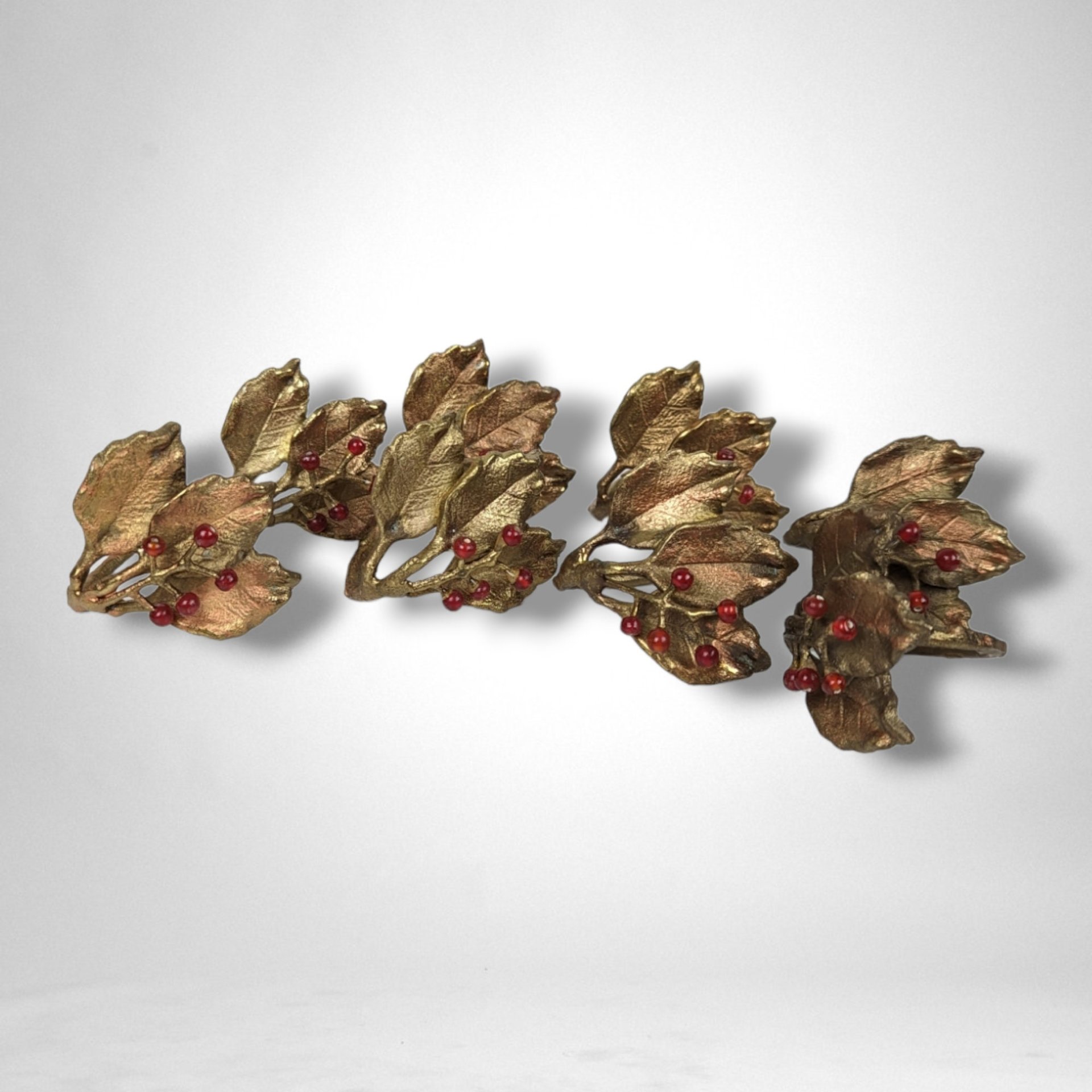 Set of 8 Vintage Brass Leaf Shaped Napkin Rings with Red Berries