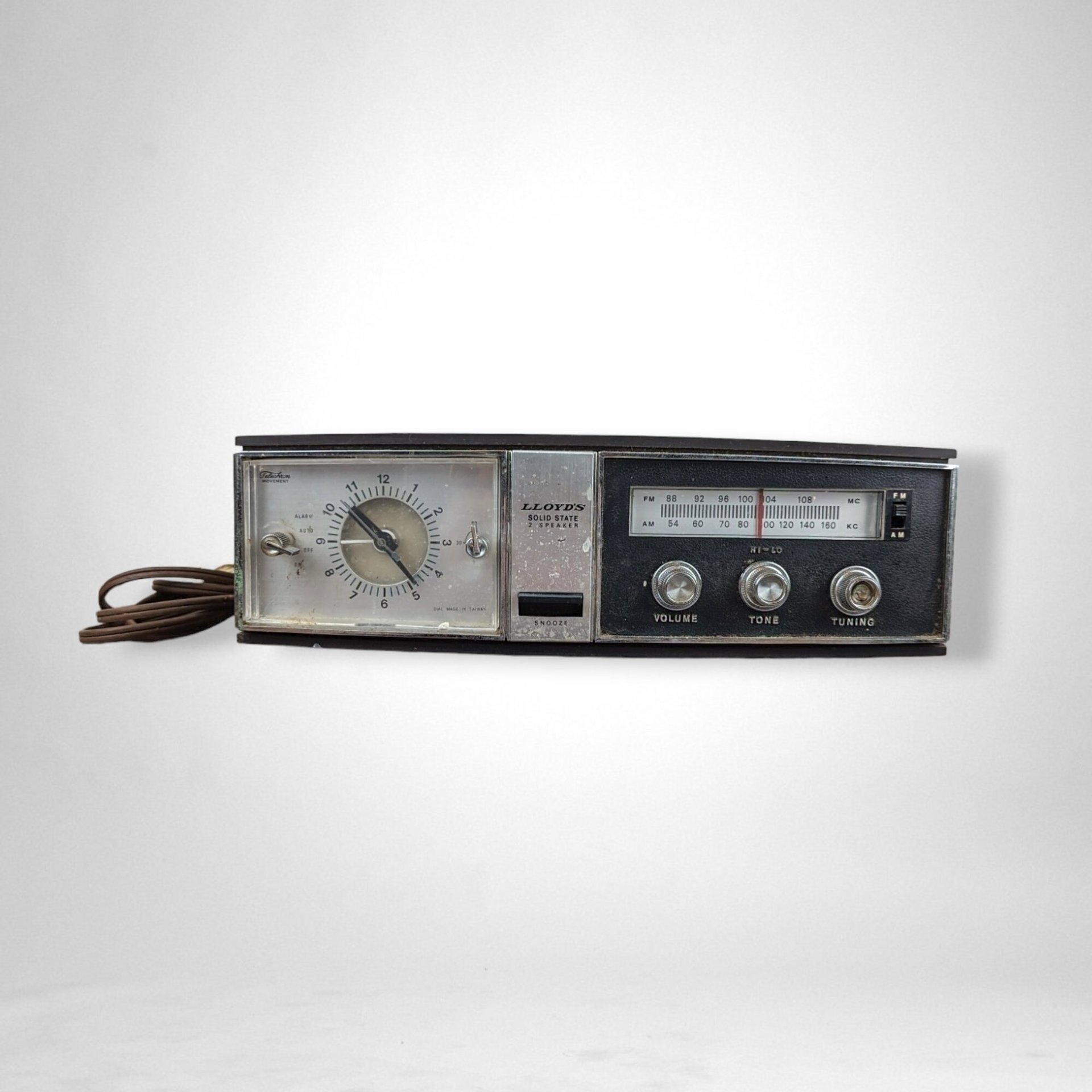 Vintage Lloyds Solid State Clock Radio