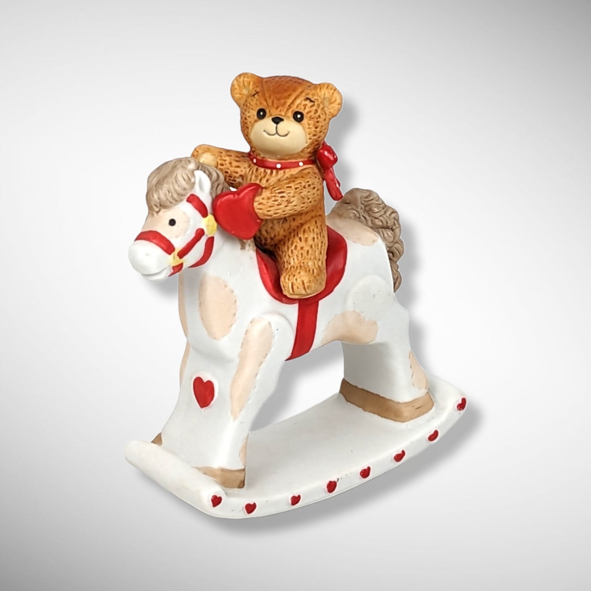 1981 Enesco Lucy and Me Bear on Rocking Horse Figurine