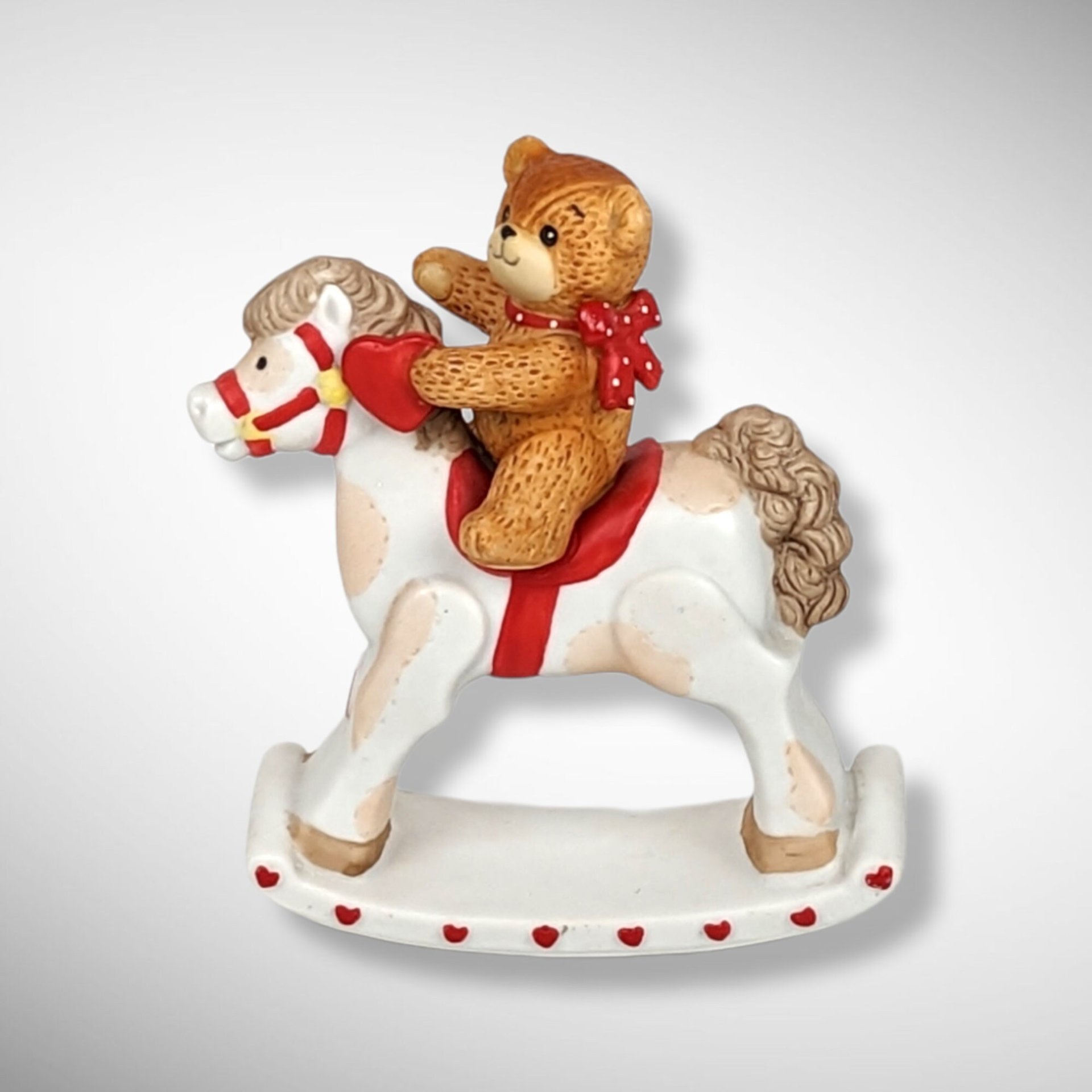 1981 Enesco Lucy and Me Bear on Rocking Horse Figurine
