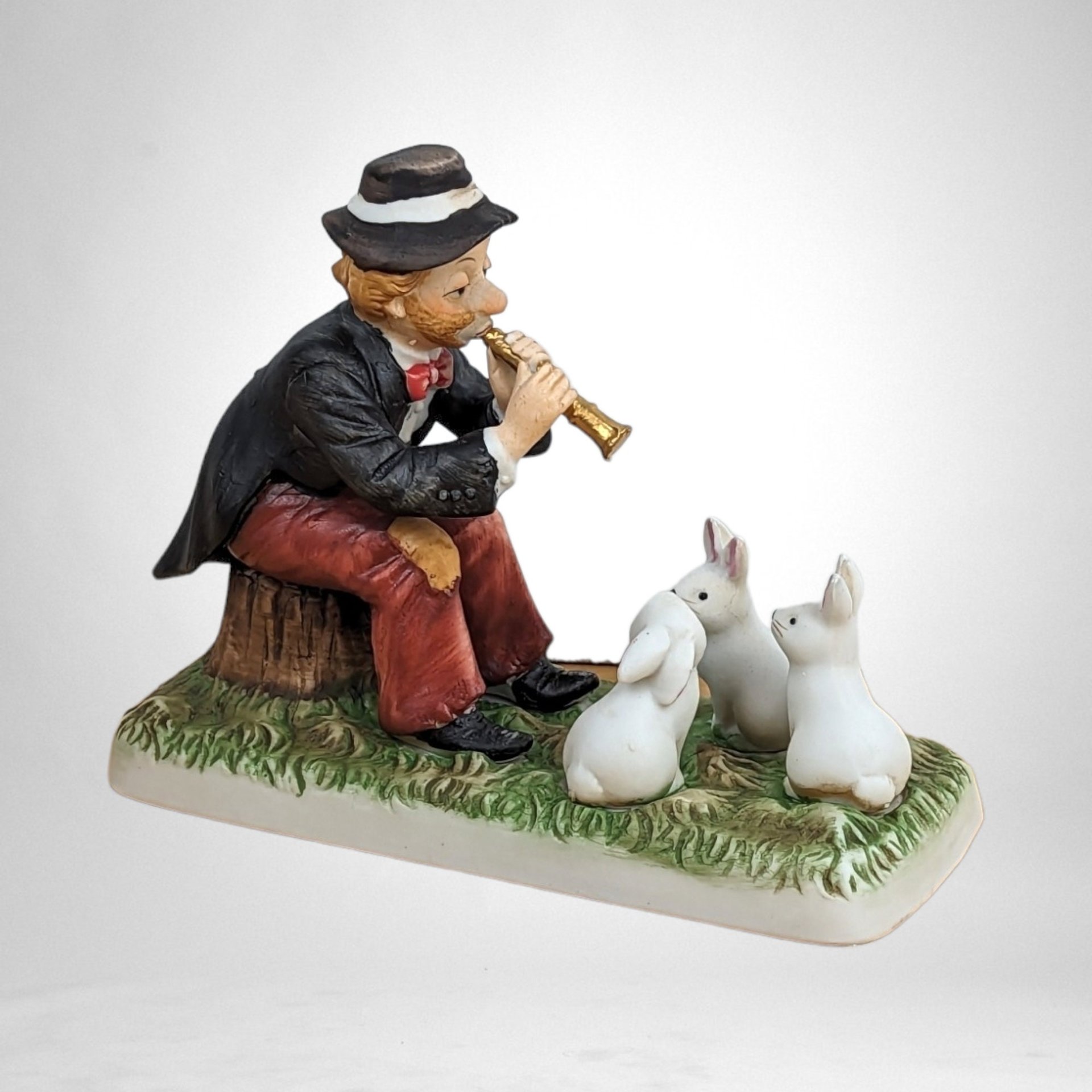 Whimsical Harmony: 1993 Melody in Motion 'Charmed Bunnies' Figurine