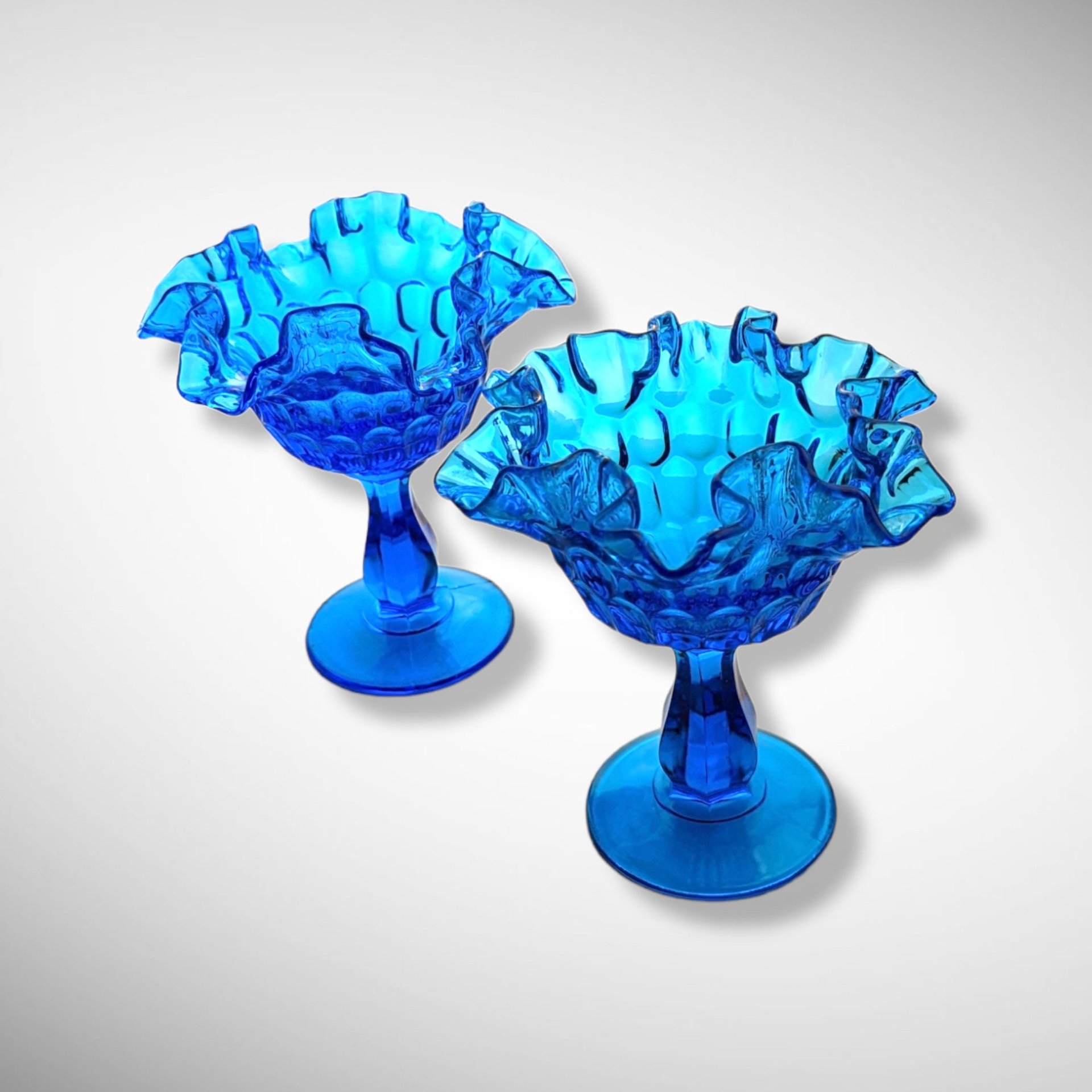 Pair of Fenton Colonial Blue Thumbprint Compotes