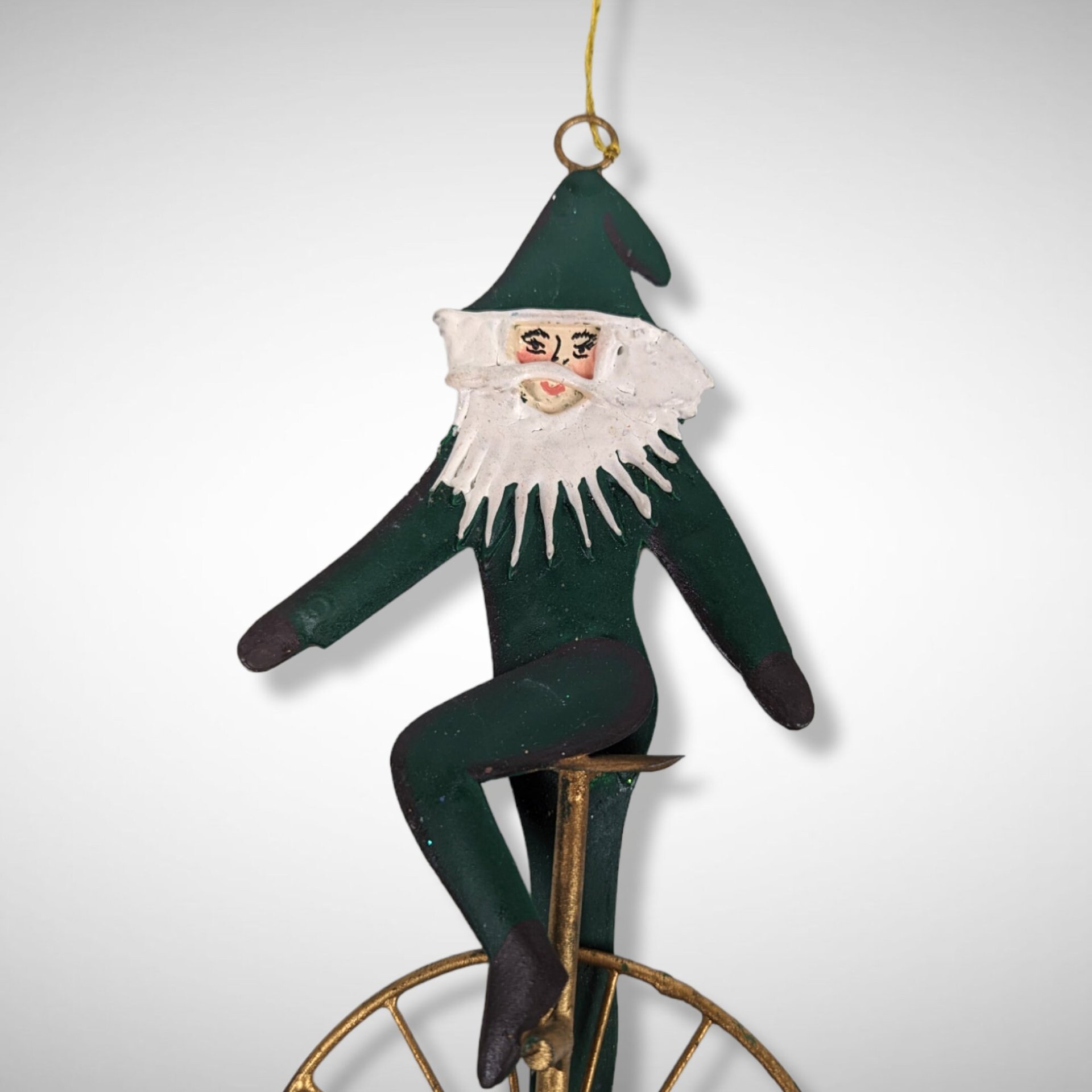 1992 Charlene Smith Signed Metal Ornament of Santa on a Unicycle