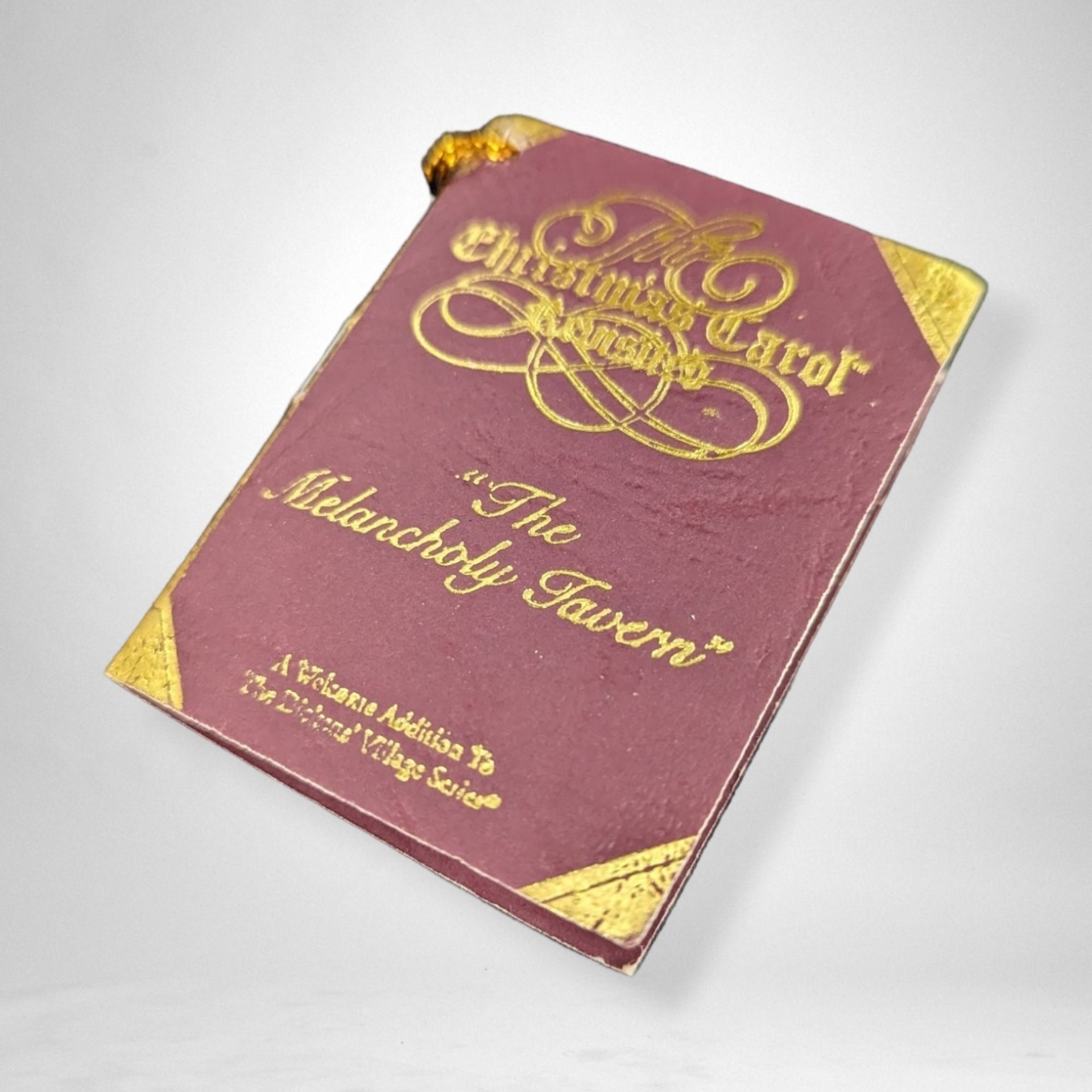 Dept. 56 Dickens Village Melancholy Tavern – A Charming Collectible