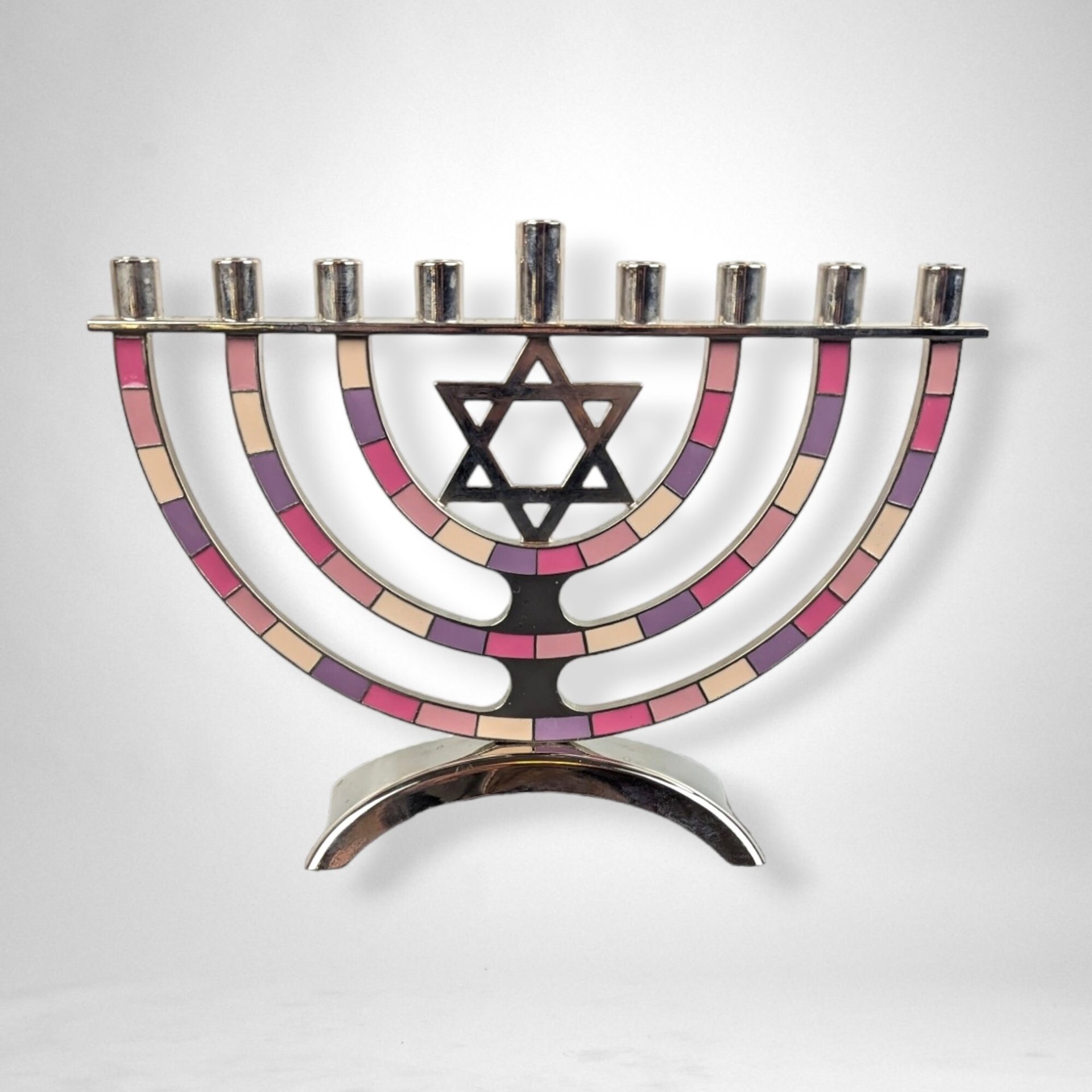 Illuminate Your Hanukkah with a Colorful Metal Menorah