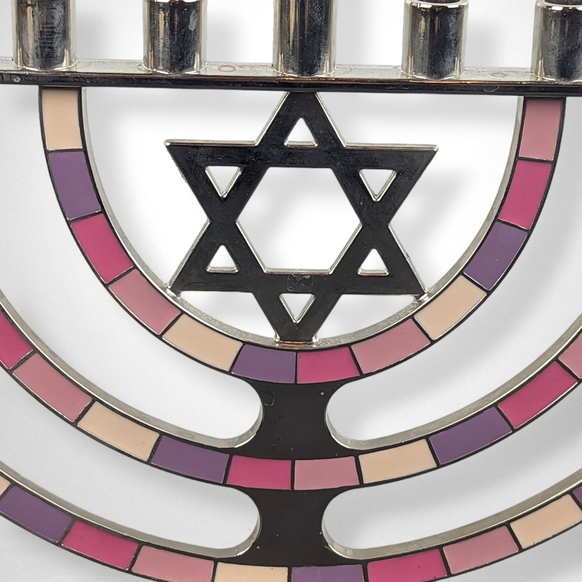 Illuminate Your Hanukkah with a Colorful Metal Menorah