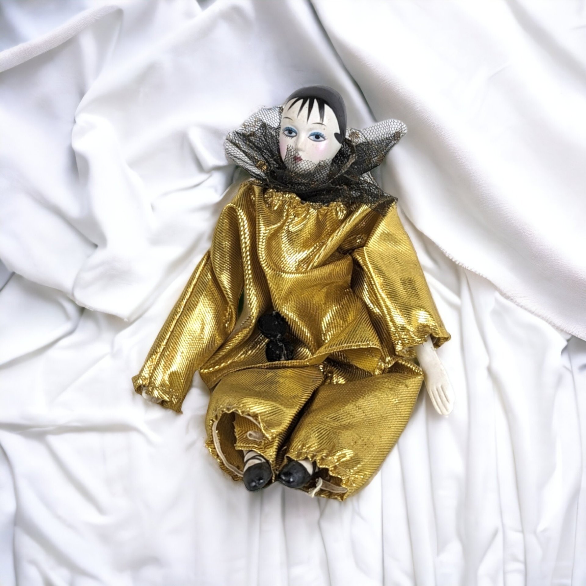 Porcelain Gold Glamour Harlequin Doll: A Touch of Elegance and Mystery