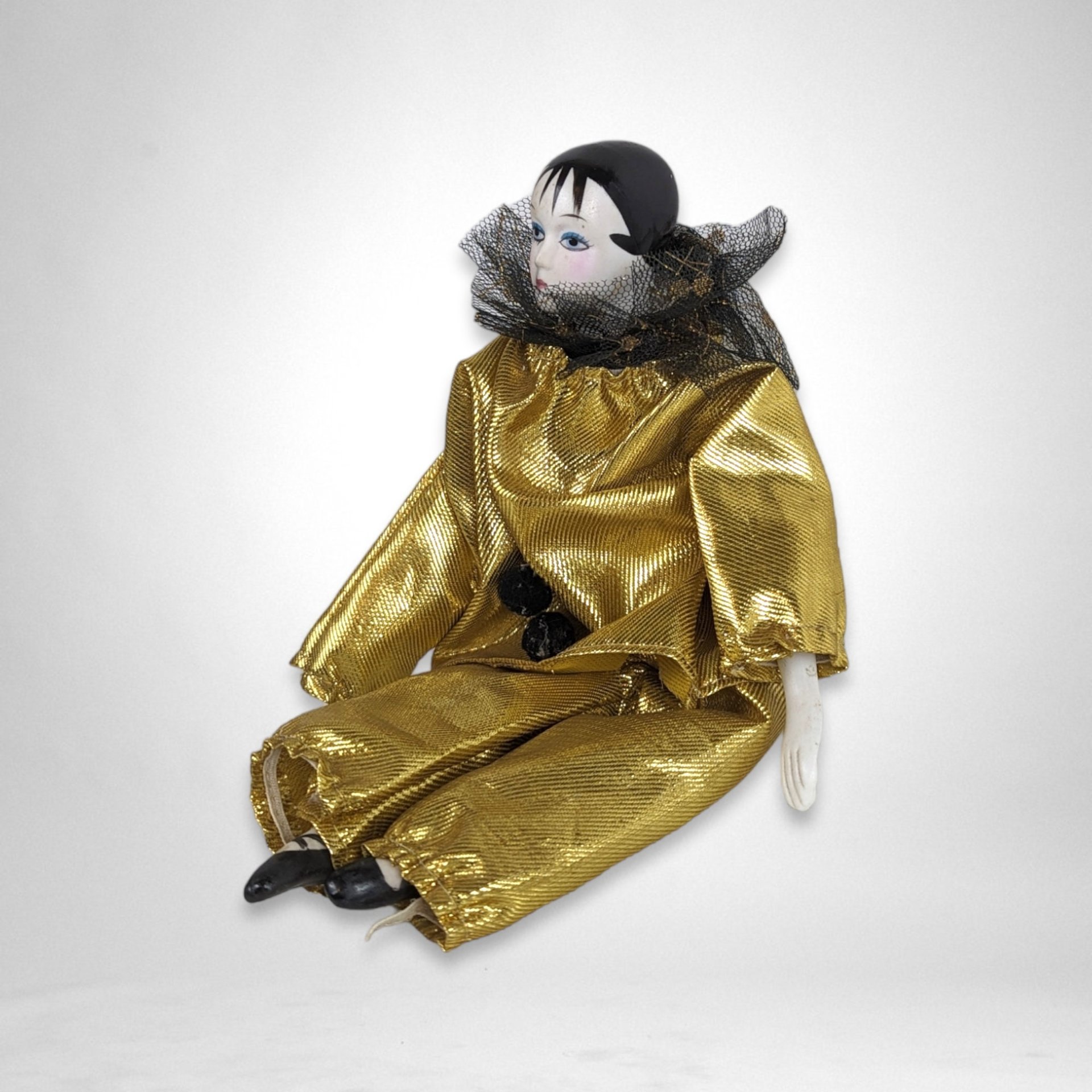 Porcelain Gold Glamour Harlequin Doll: A Touch of Elegance and Mystery