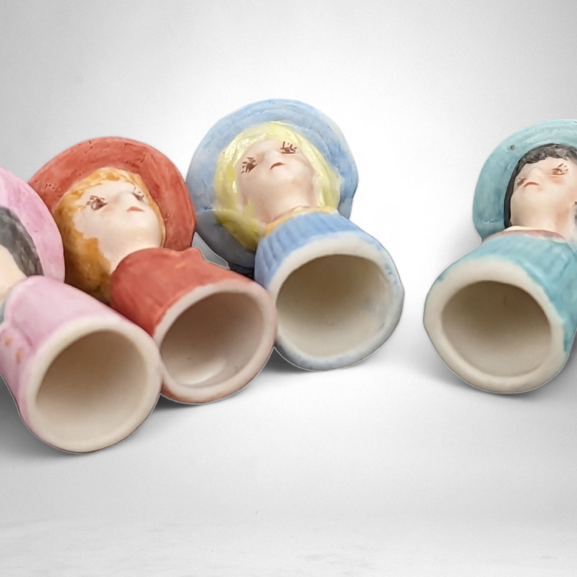Set of 4 Ceramic Lady Head Thimble Figurines: Delicate Collectibles