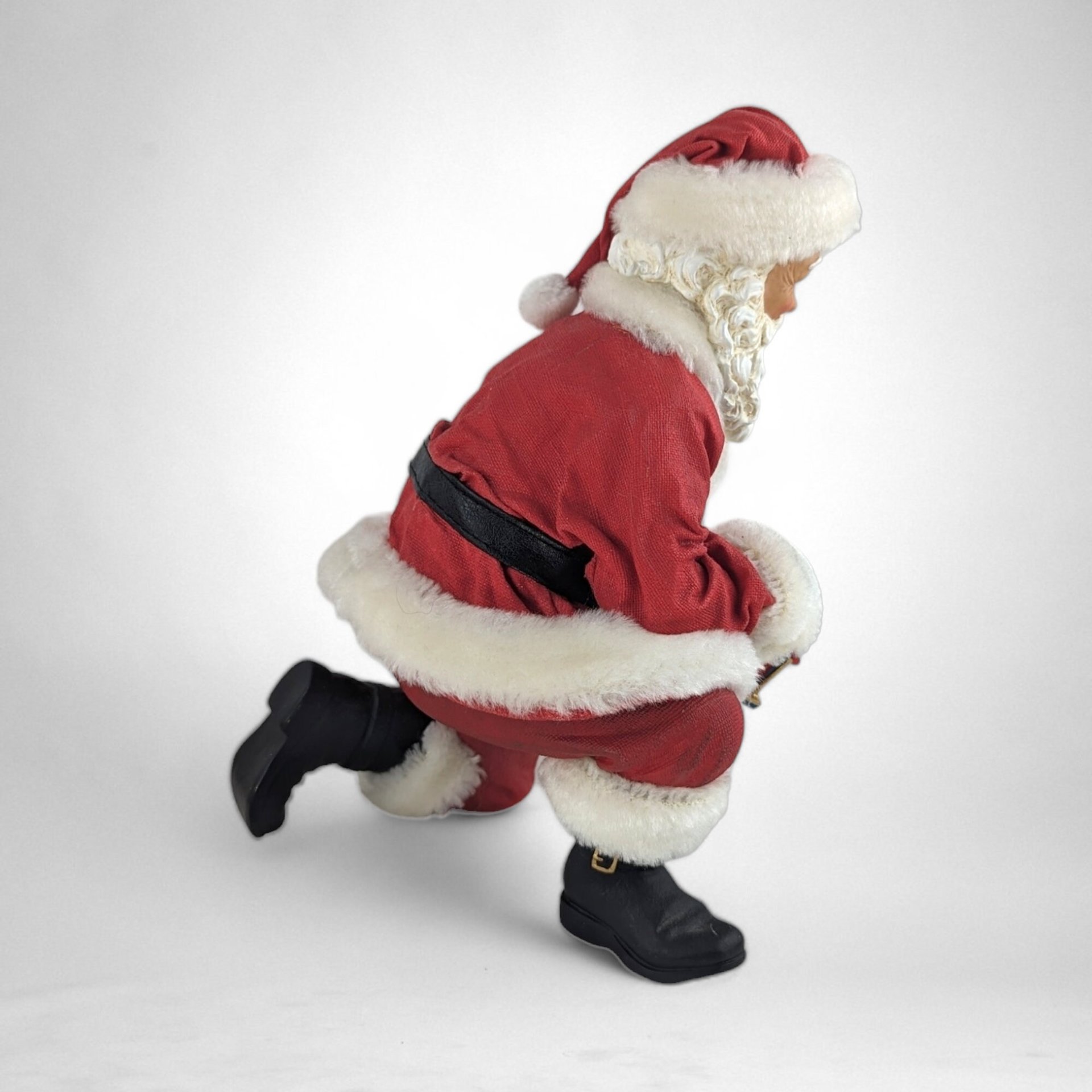 Vintage Fabriche Santa Kneeling Holding Toy Train Figure – Timeless Holiday Delight