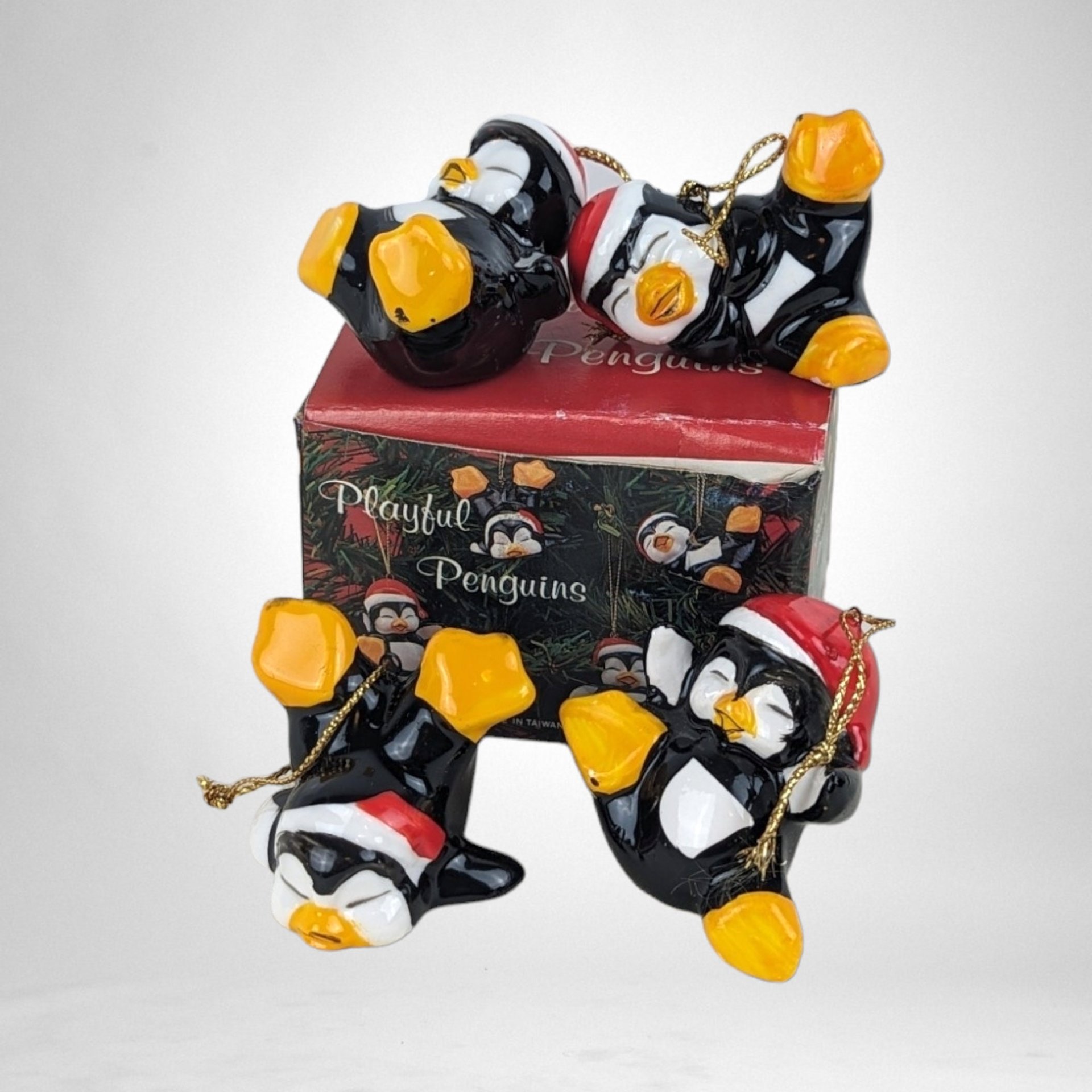 Vintage Set of 4 Playful Penguins Ceramic Christmas Tree Ornaments - Charming Holiday Decorations
