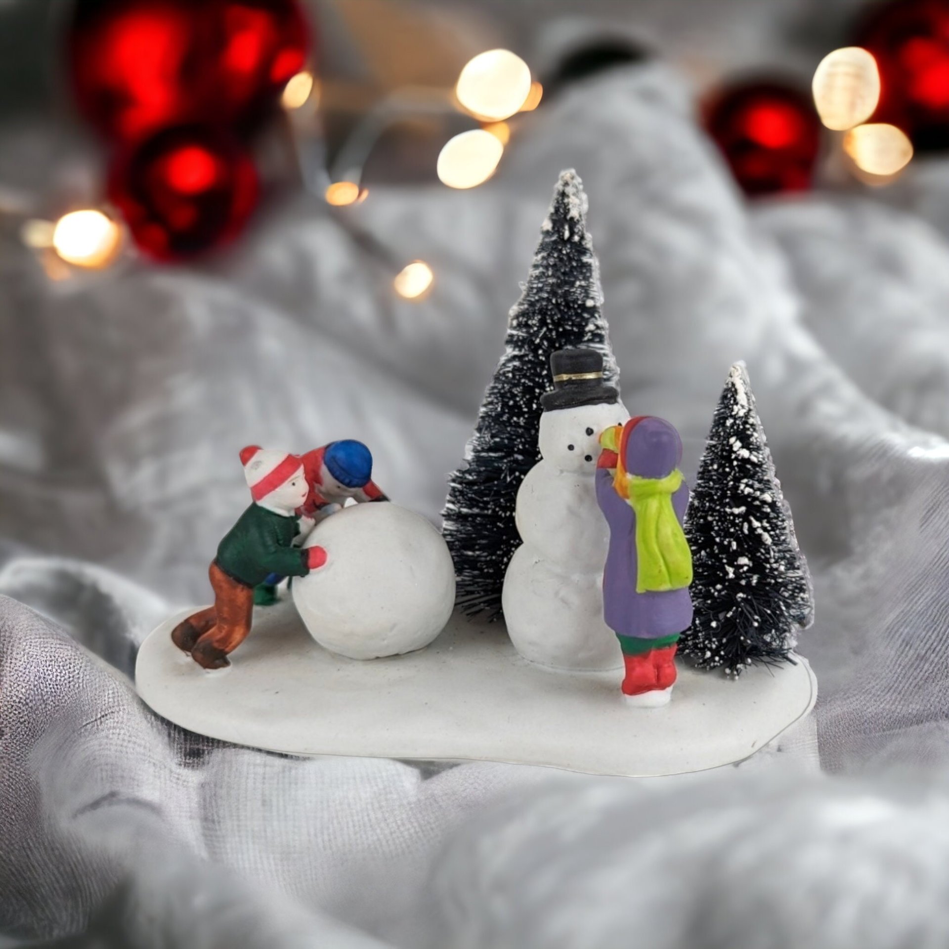 Frosty Fun: 1996 Lemax Village Children Building Snowmen Figurine