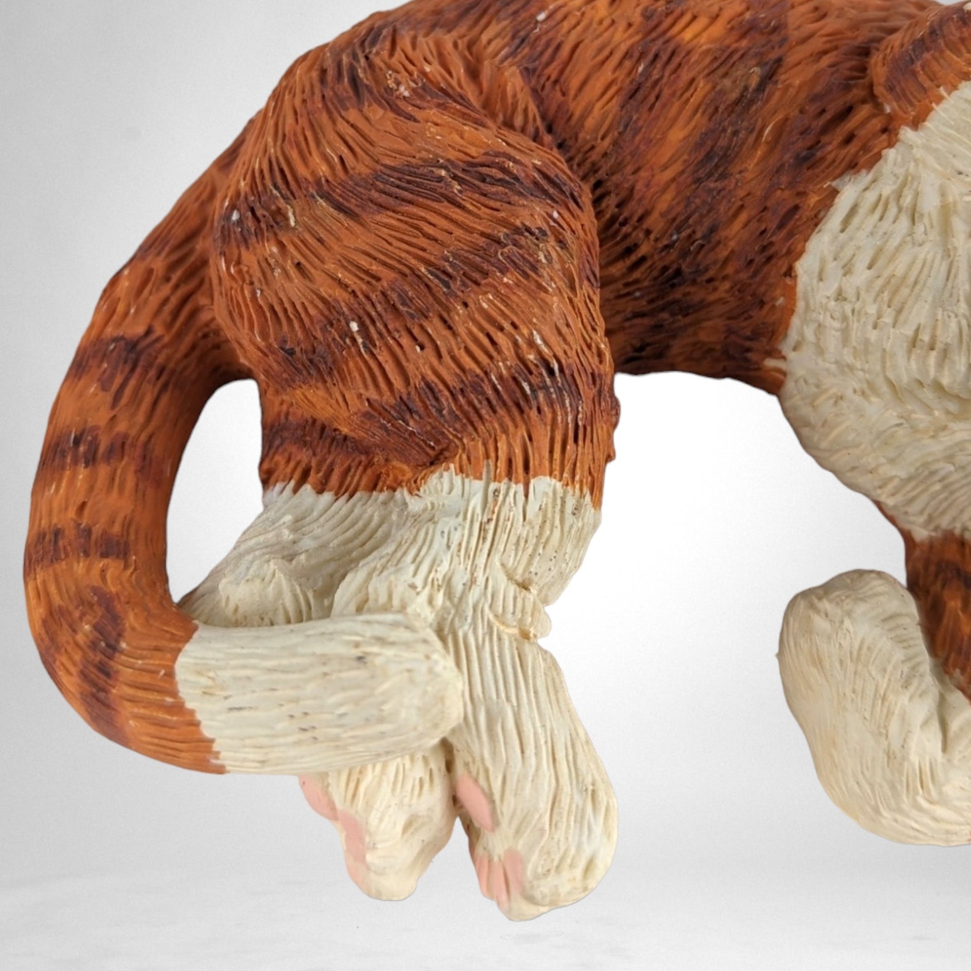 Whiskered Holiday Charm: 1995 Enesco Kathy Wise Resin Striped Cat with Santa Cap Figurine