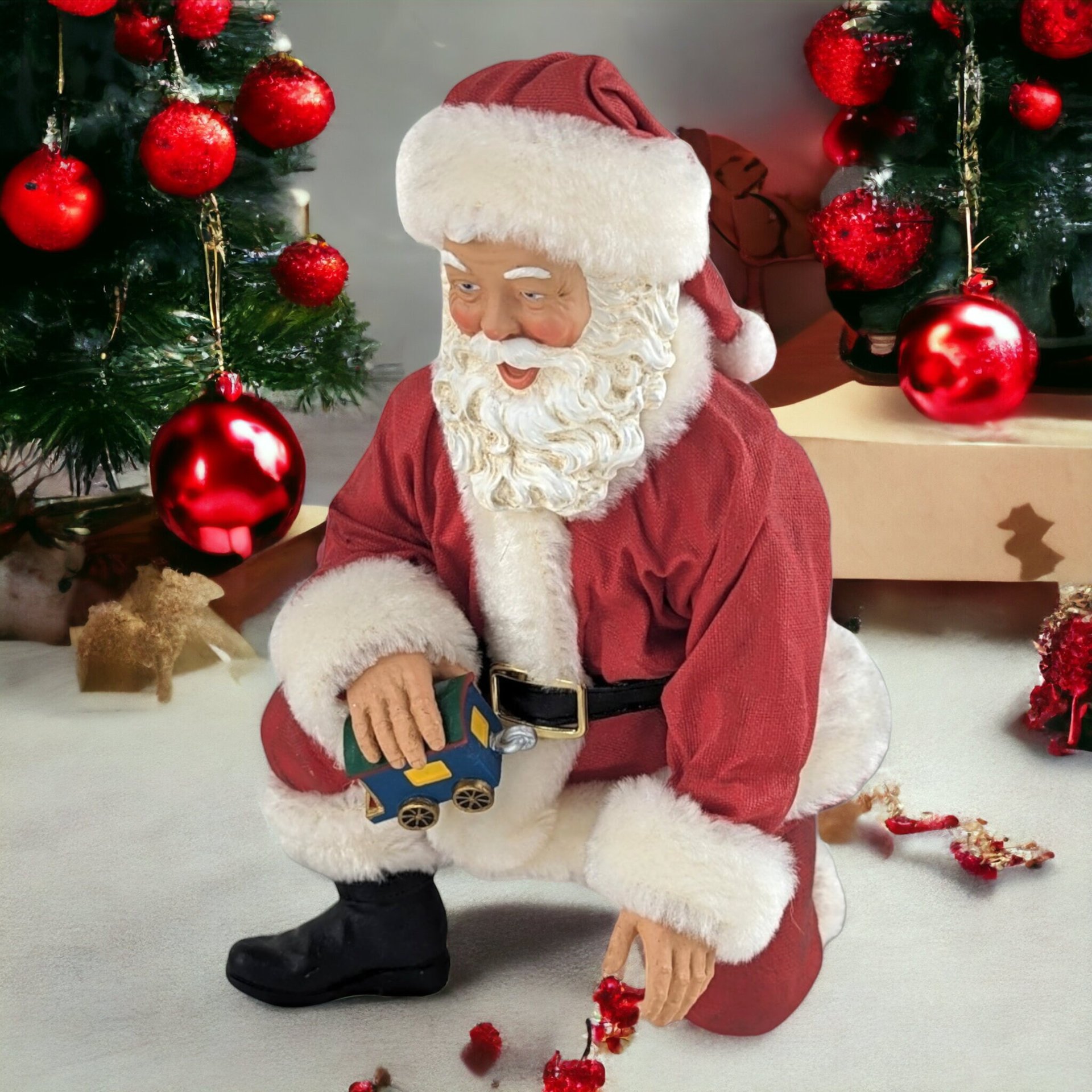 Vintage Fabriche Santa Kneeling Holding Toy Train Figure – Timeless Holiday Delight