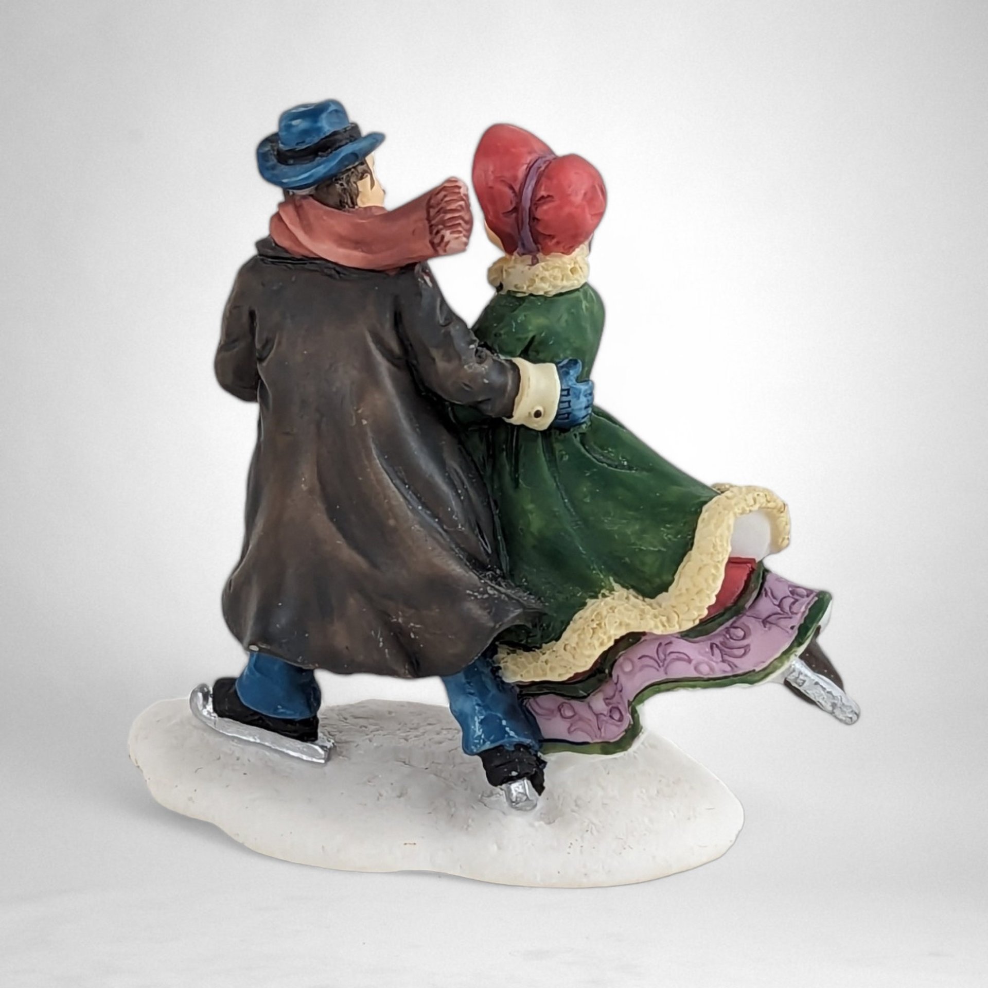 Charming Vintage O'Well Man and Woman Ice Skating Village Figurine - Timeless Winter Elegance for Your Décor!