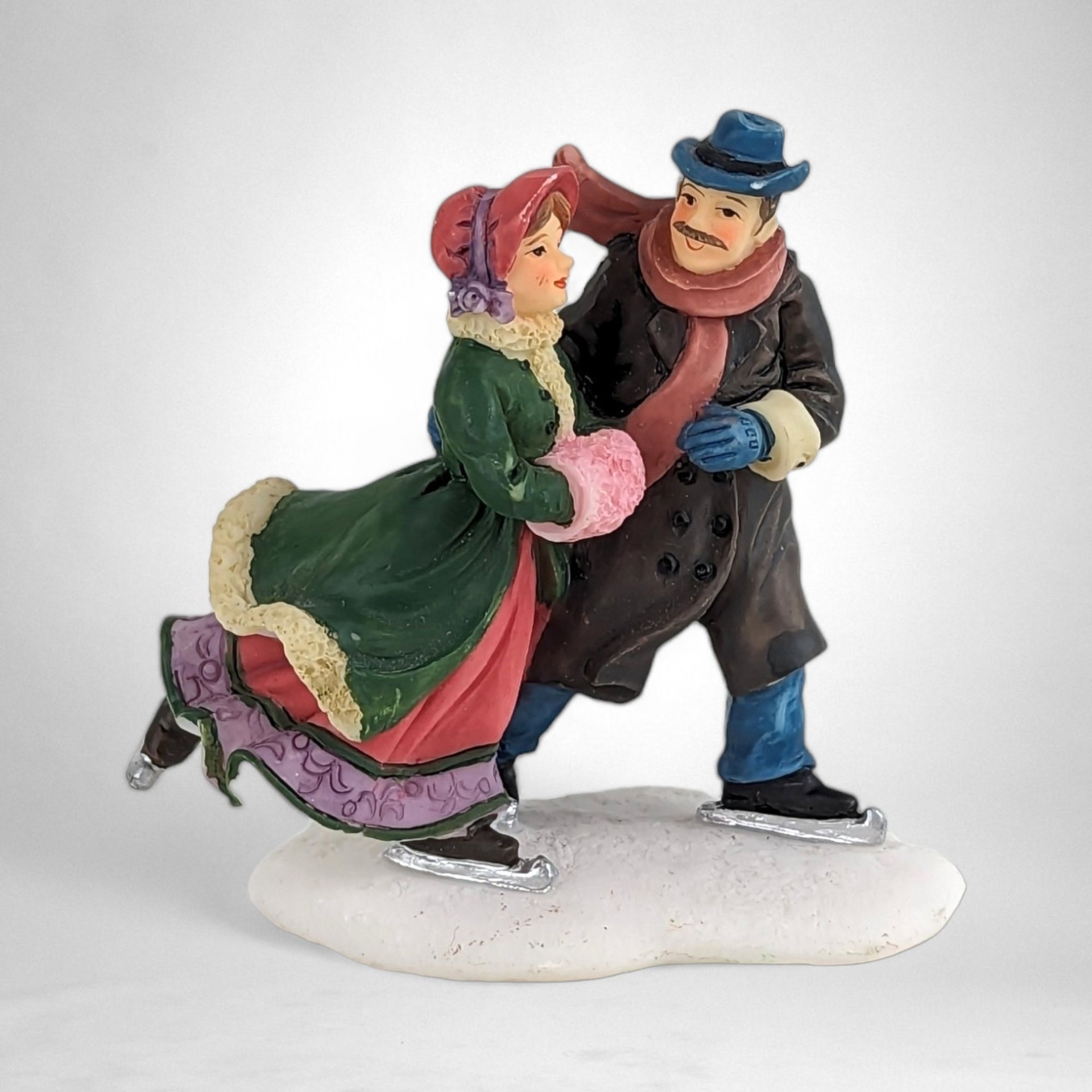 Charming Vintage O'Well Man and Woman Ice Skating Village Figurine - Timeless Winter Elegance for Your Décor!