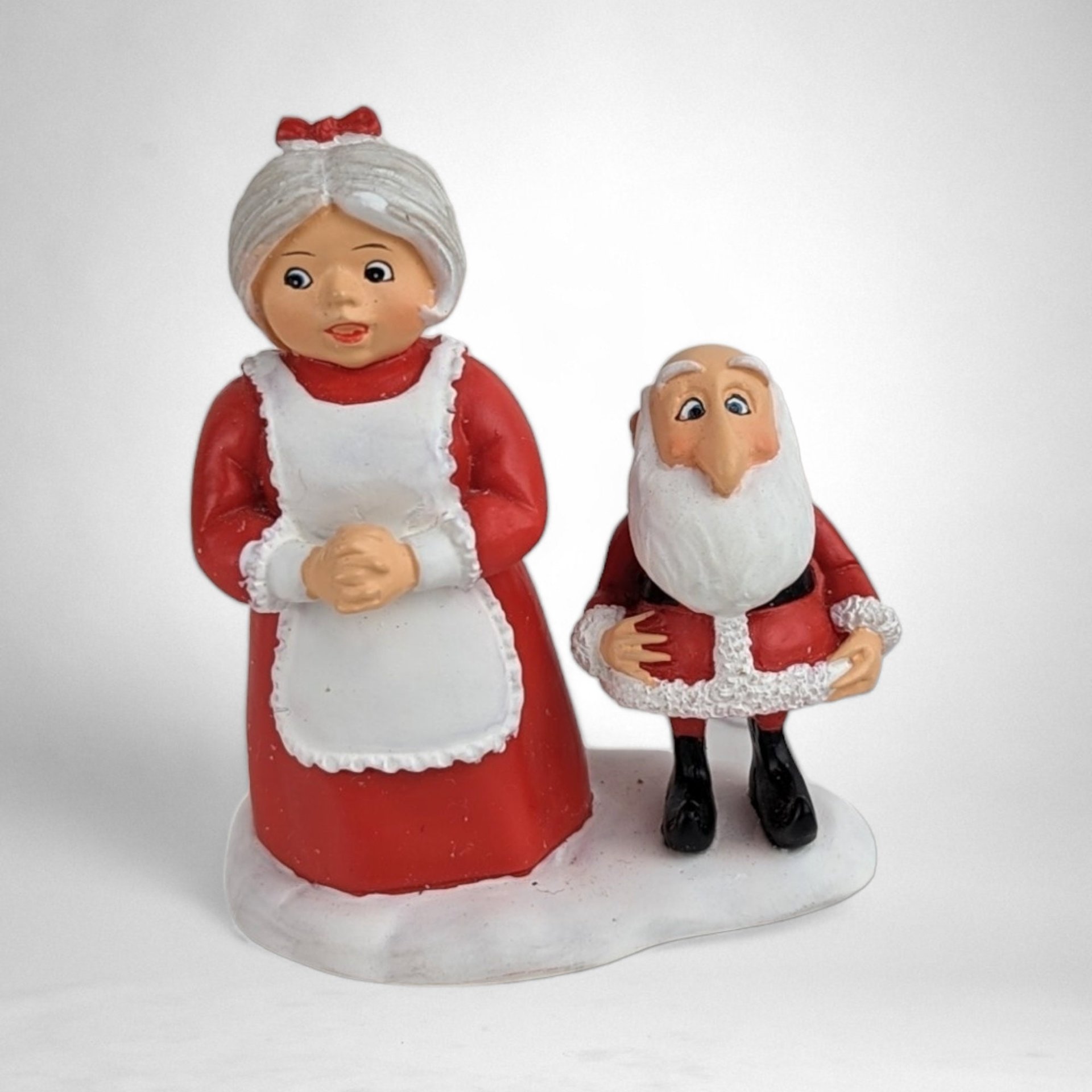 Dept. 56 Santa Claus is Coming to Town 2-Piece Figurine Set - Festive Mr. and Mrs. Claus with Elves