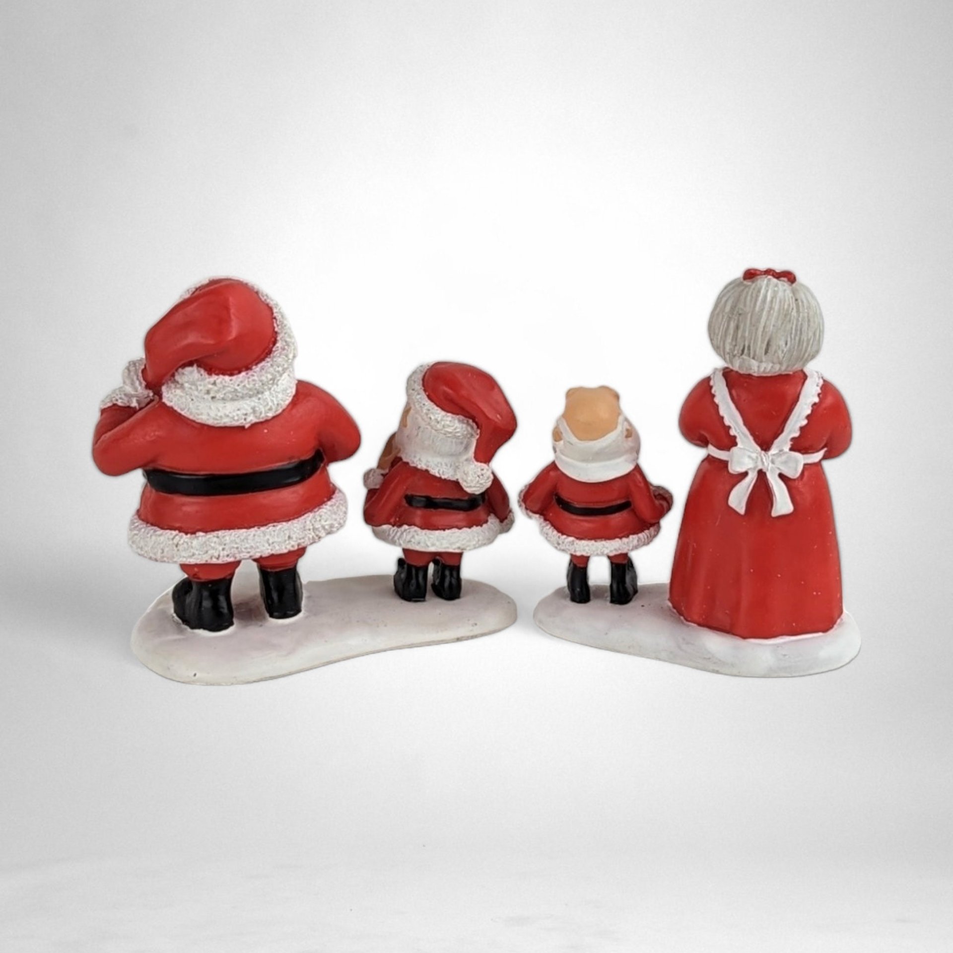 Dept. 56 Santa Claus is Coming to Town 2-Piece Figurine Set - Festive Mr. and Mrs. Claus with Elves