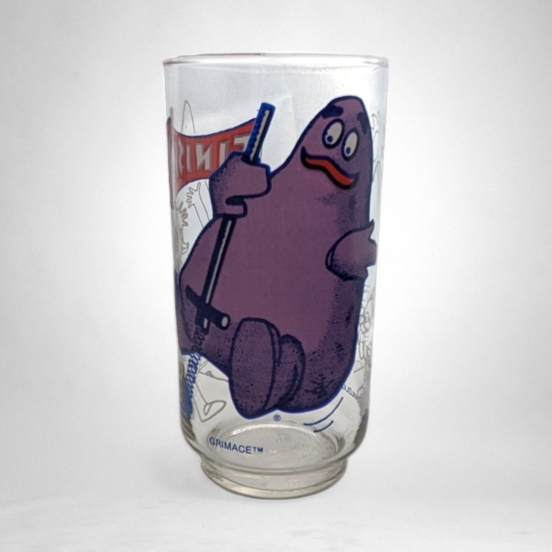 Pair of 1977 McDonald's Action Series Collectible Glasses - Retro Fast Food Memorabilia