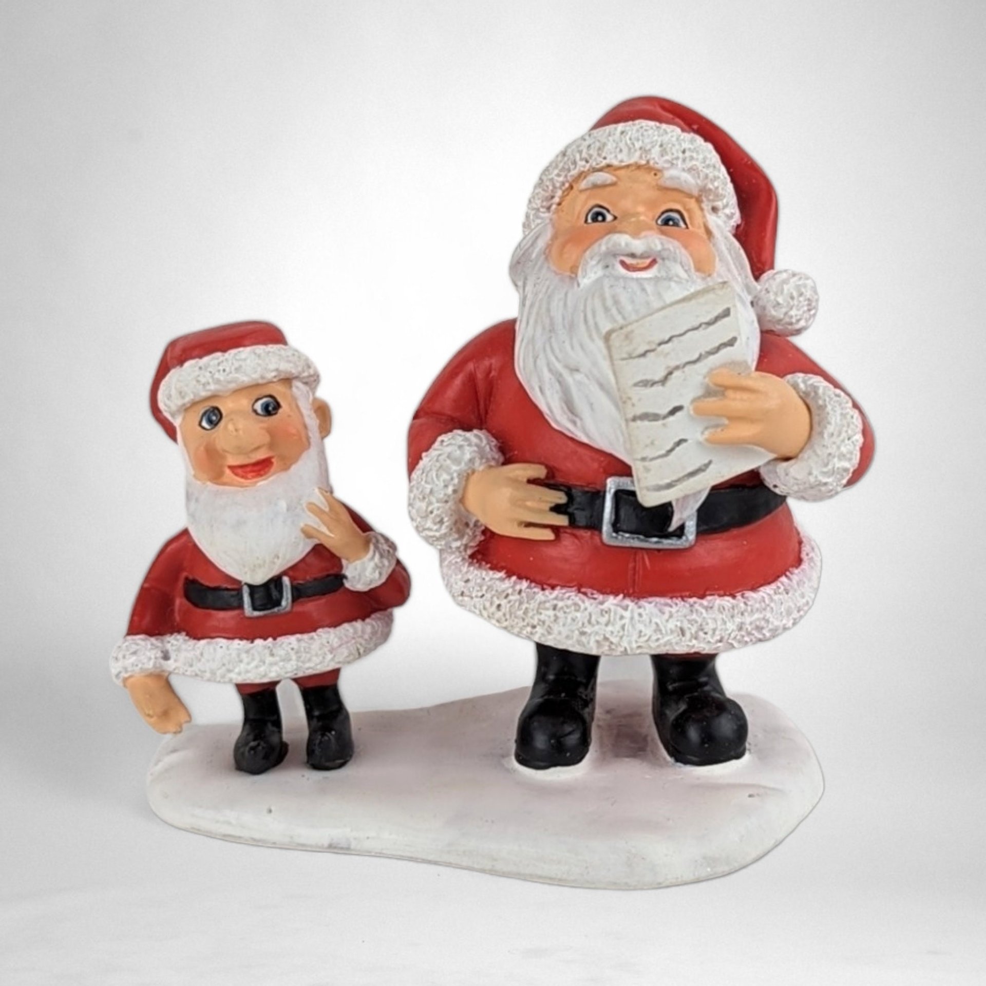 Dept. 56 Santa Claus is Coming to Town 2-Piece Figurine Set - Festive Mr. and Mrs. Claus with Elves
